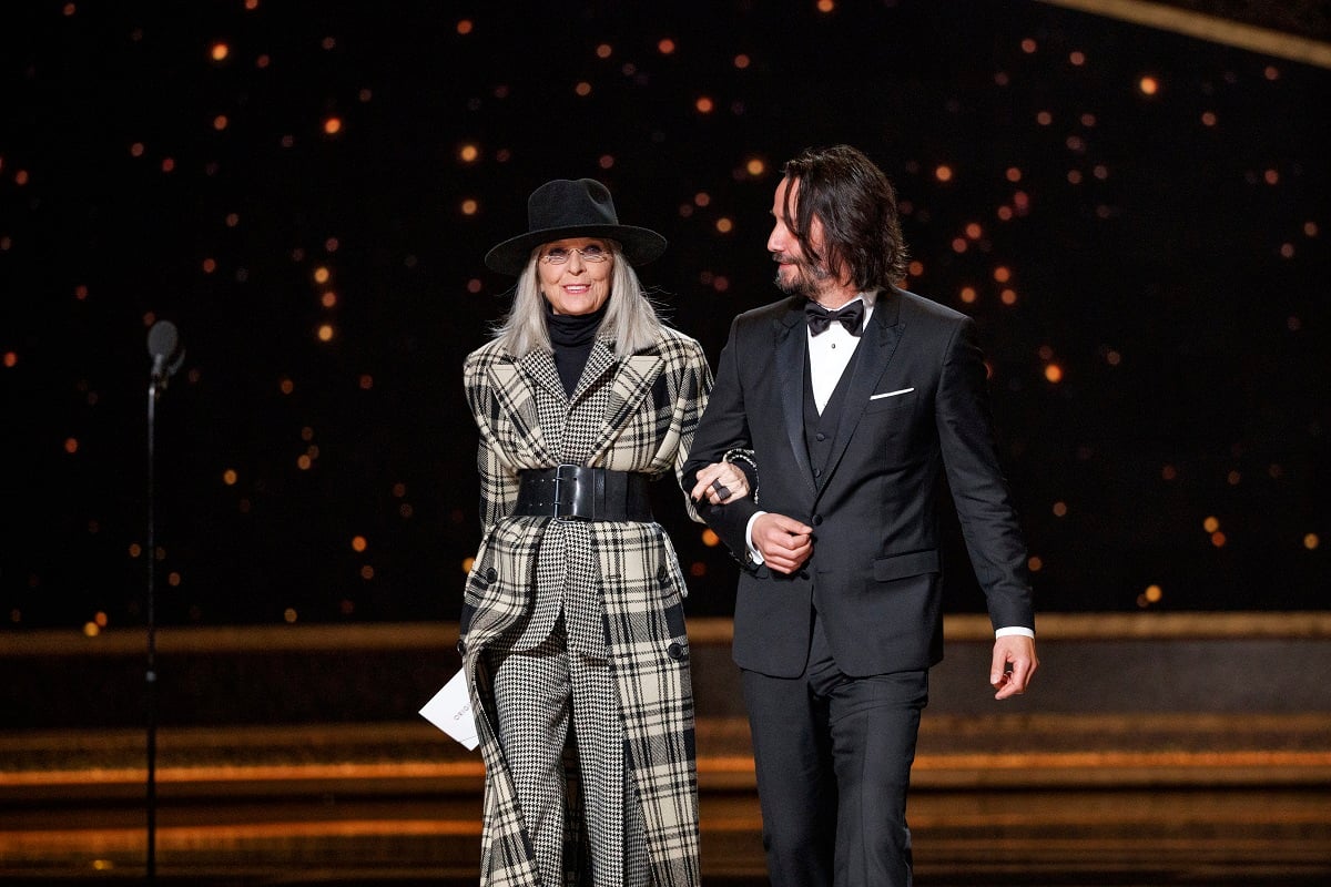 Diane Keaton standing alongside Keanu Reeves at the Oscars.