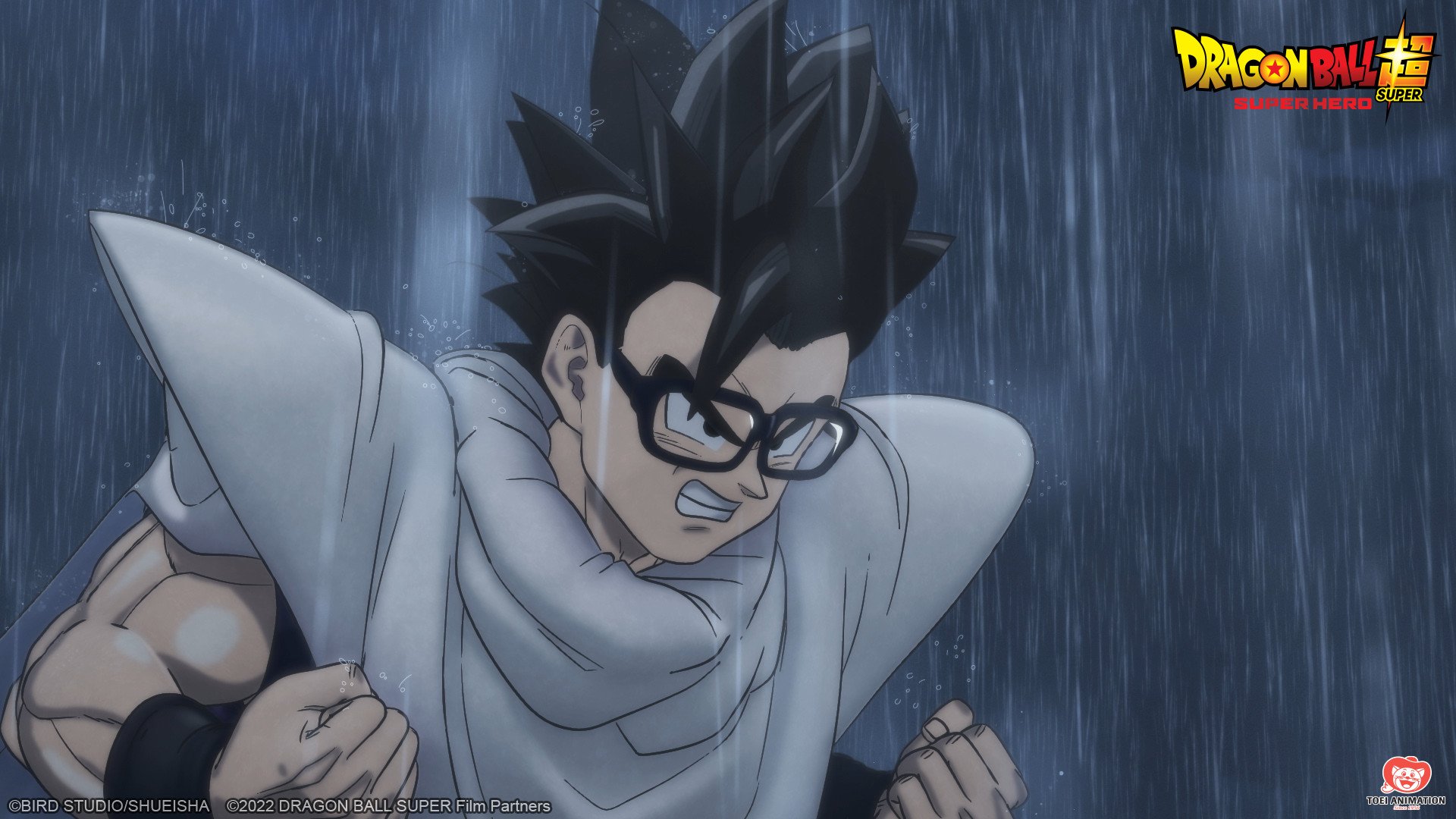 Eine Aufnahme von Gohan in „Dragon Ball Super: Super Hero“ für unseren Artikel über die Szene mit dem Abspann. Er steht im Regen und hält seine Fäuste hoch.