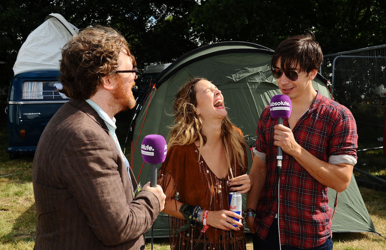 Drew Barrymore and Justin Long at a festival in 2010