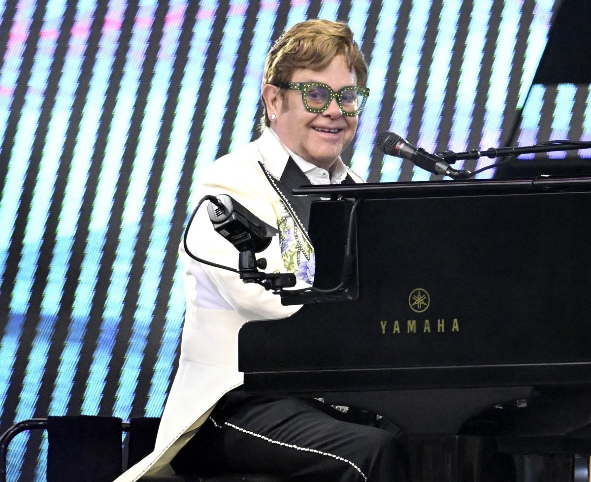 Elton John plays the piano during performance at Hyde Park in London