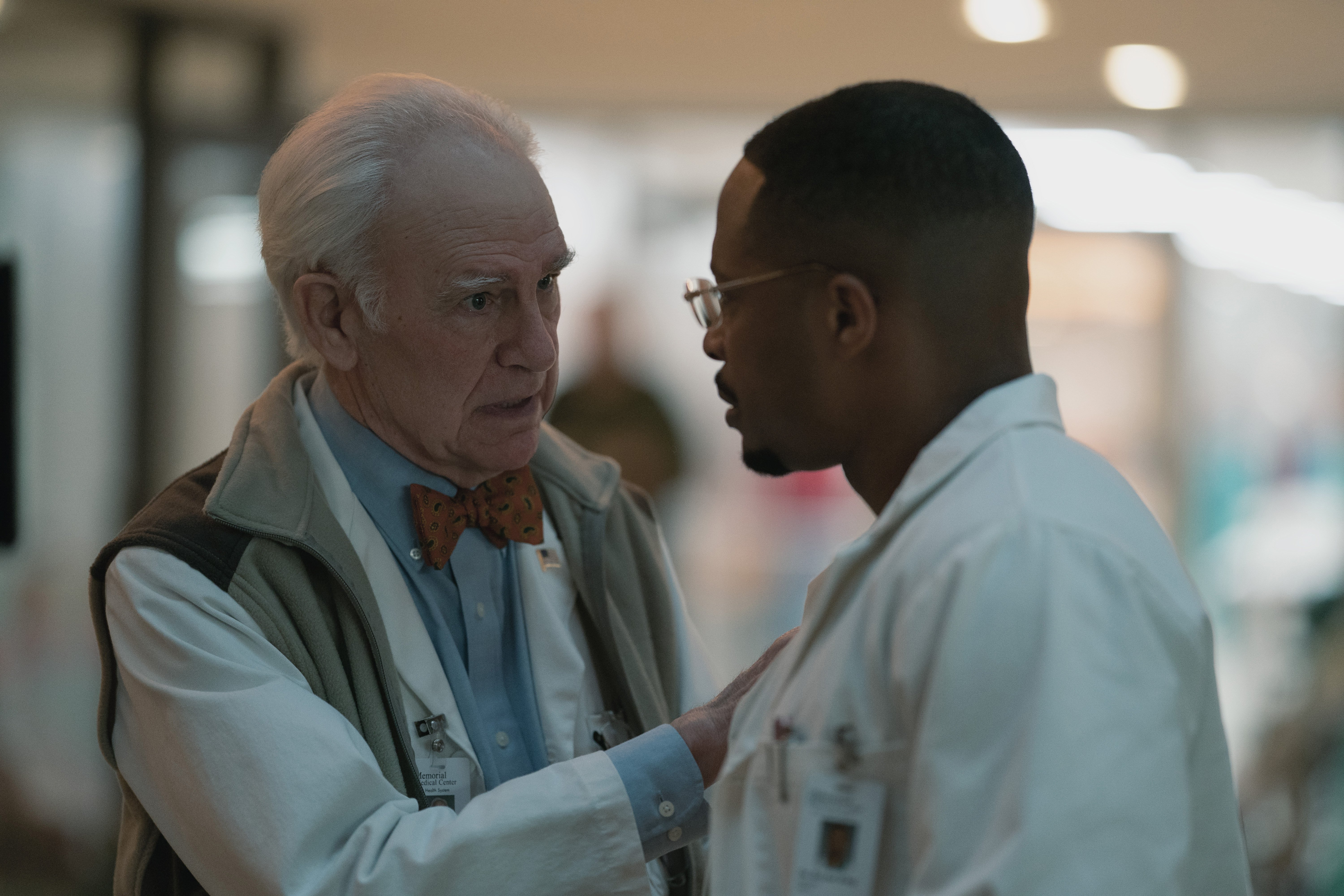 'Five Days At Memorial' cast members Robert Pine and Cornelius Smith Jr. looking at each other in conversation