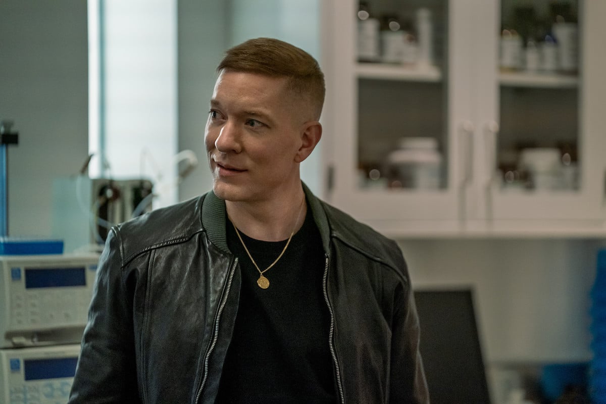 Joseph Sikora as Tommy Egan smirking wearing all black in 'Power Book IV: Force' |