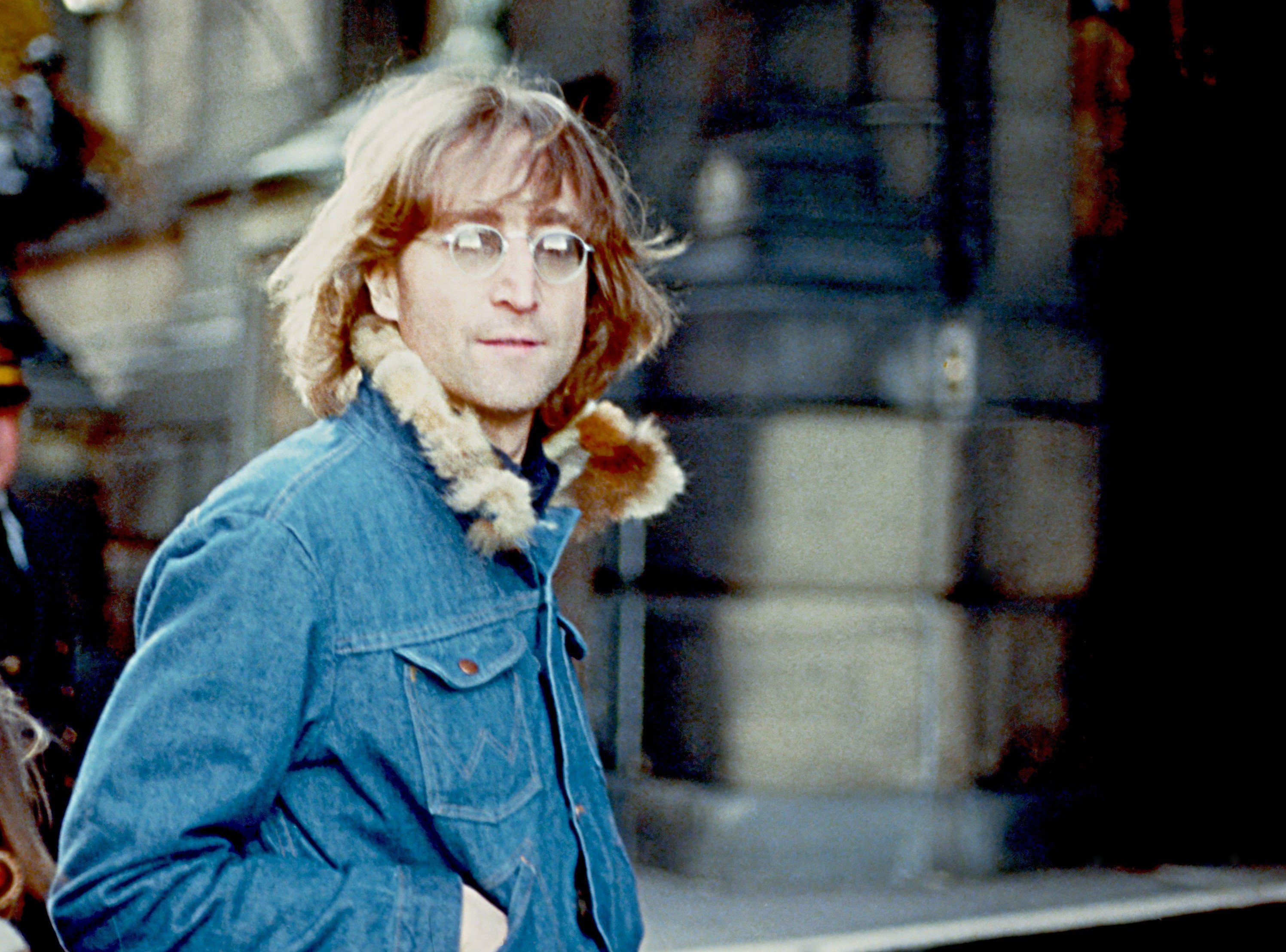 Former Beatle John Lennon, who owned New York apartments, poses for a photo with his wife Yoko Ono and son Sean Lennon in 1977 in New York City