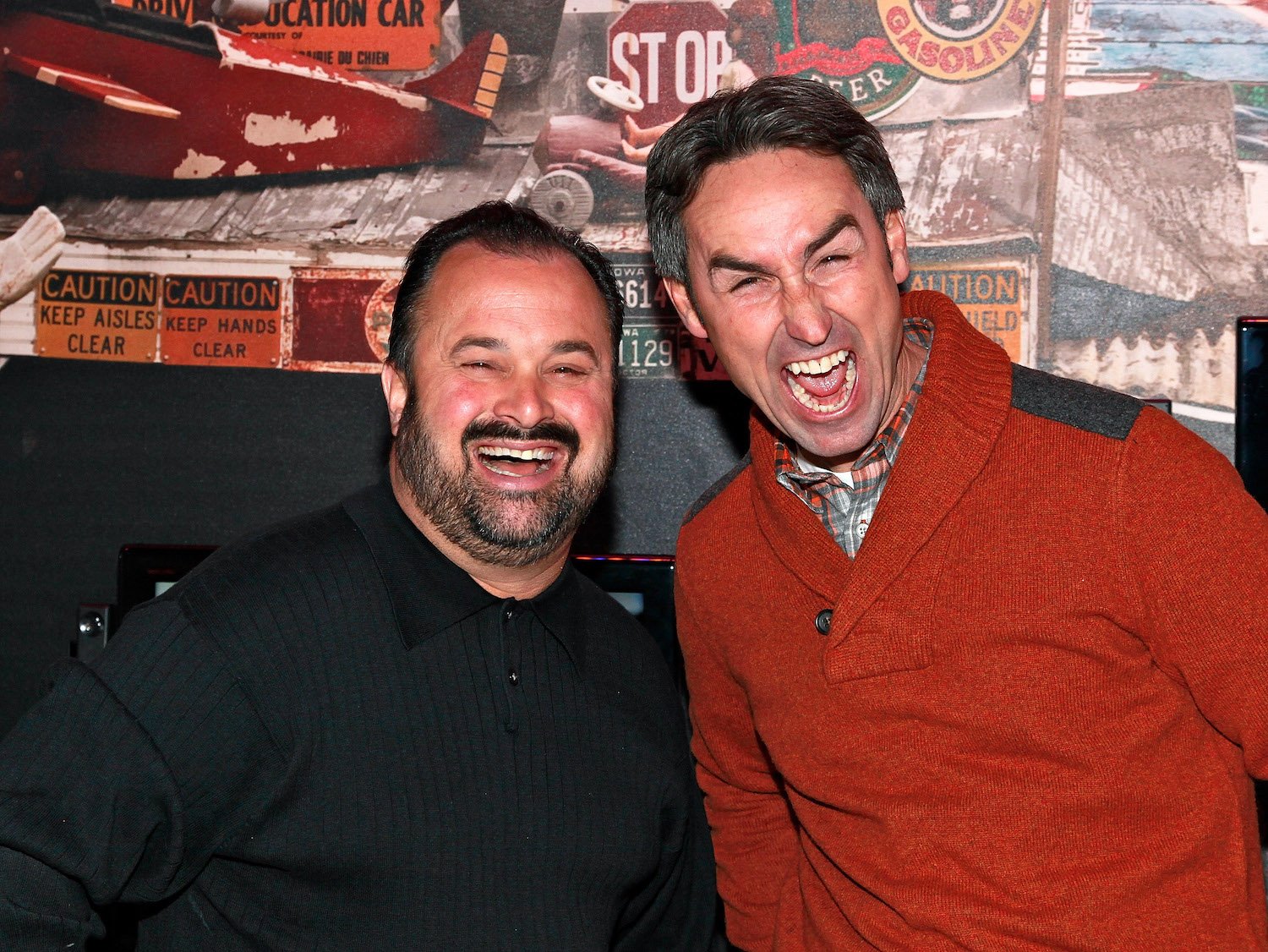 Frank Fritz and Mike Wolfe from 'American Pickers' standing next to each other and smiling excitedly
