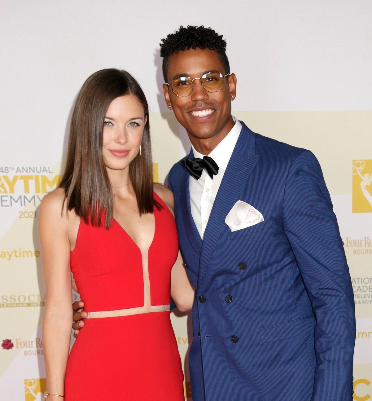 'General Hospital' stars Katelyn MacMullen and Tahj Bellow pose together for photographers on the red carpet.