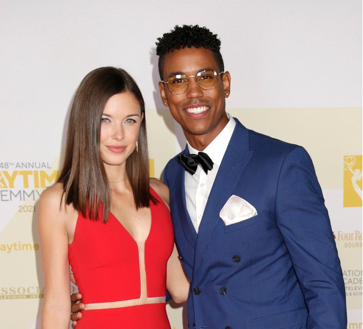 'General Hospital' stars Katelyn MacMullen and Tahj Bellow pose together for photographers on the red carpet.