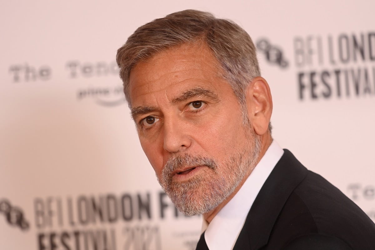 George Clooney posing at an event
