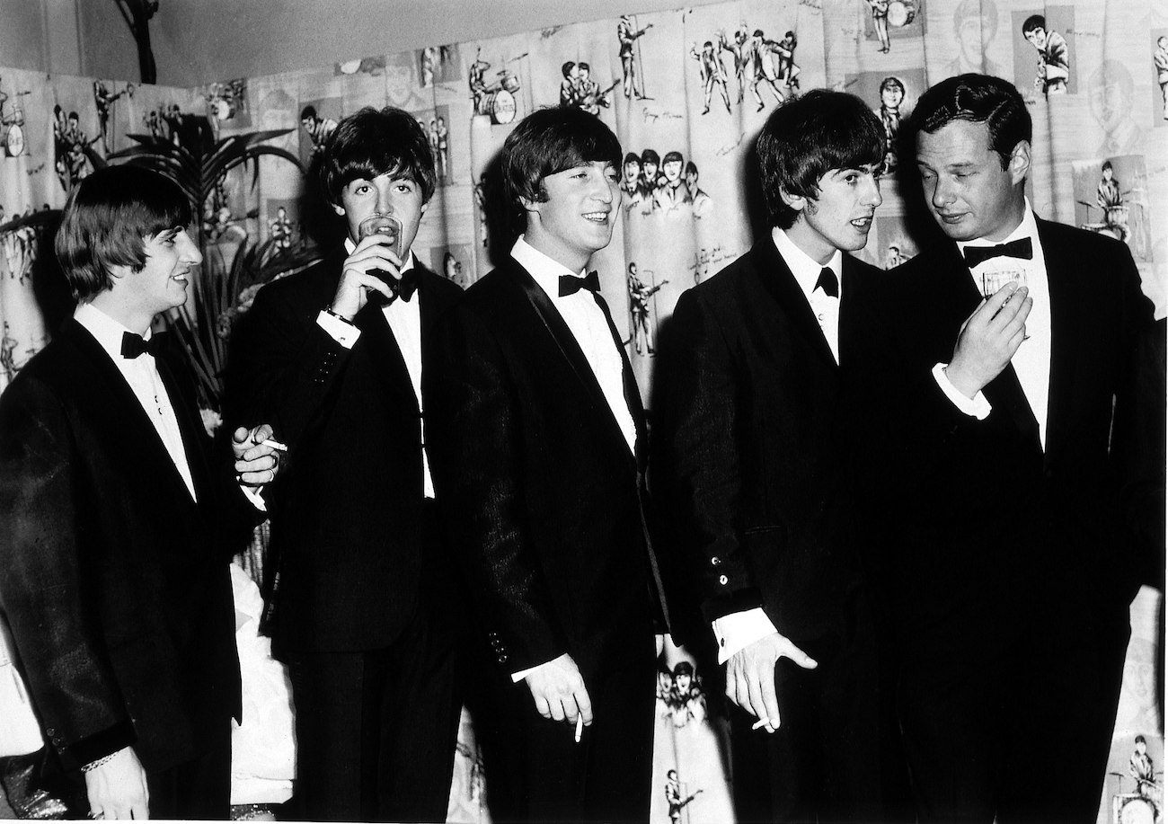 The Beatles with their manager, Brian Epstein at the premiere of 'A Hard Day's Night' in 1964.
