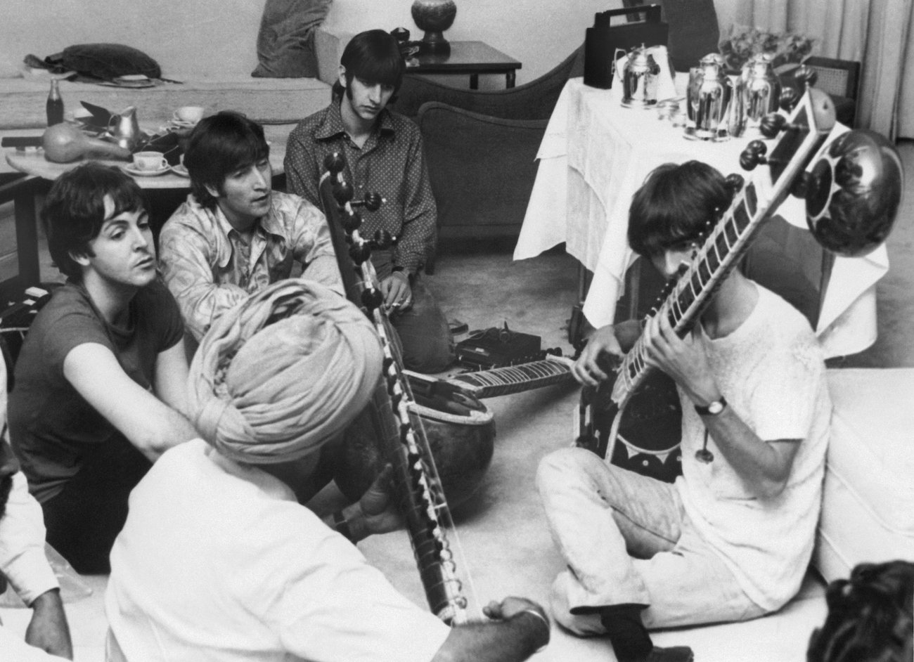 George Harrison playing Indian music in the mid-1960s.