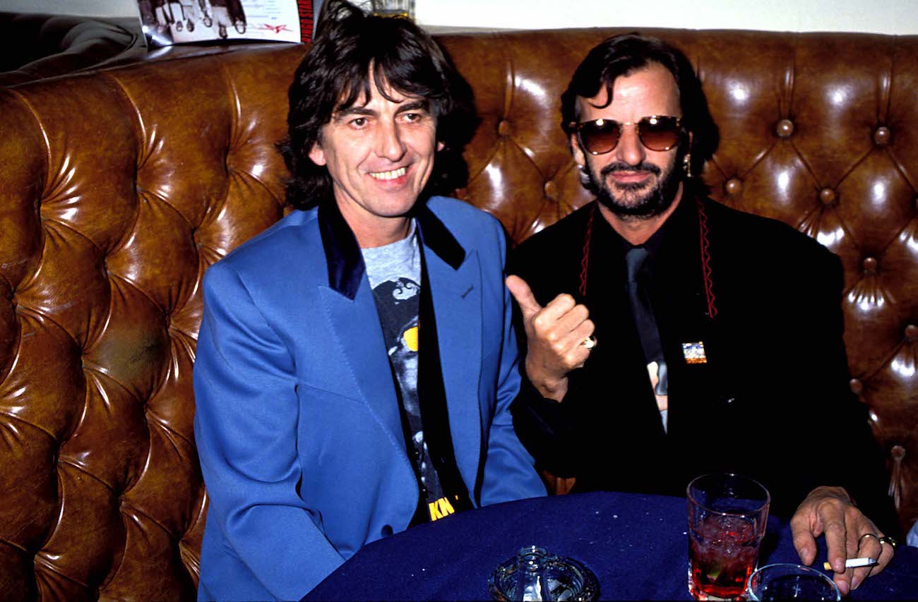 George Harrison and Ringo Starr at a party in 1990.