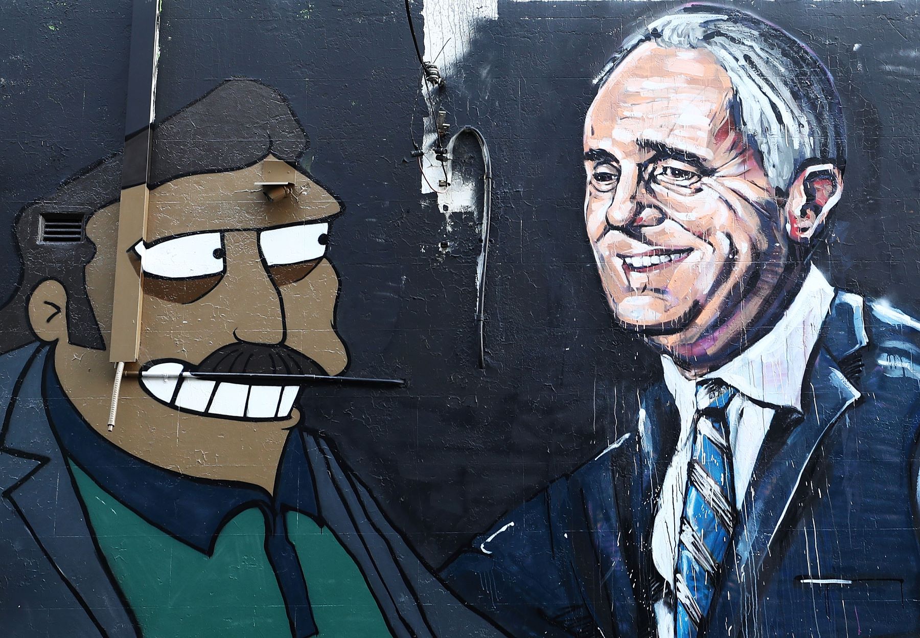 Graffiti art of Australian Prime Minister Malcolm Turnbull with 'The Simpsons' Fat Tony seen in Sydney, Australia