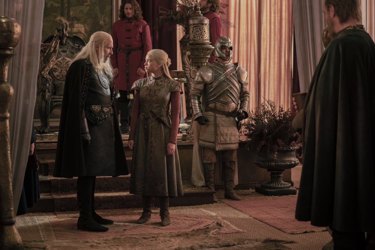 'House of the Dragon': Paddy Considine and Milly Alcock stand in front of the throne