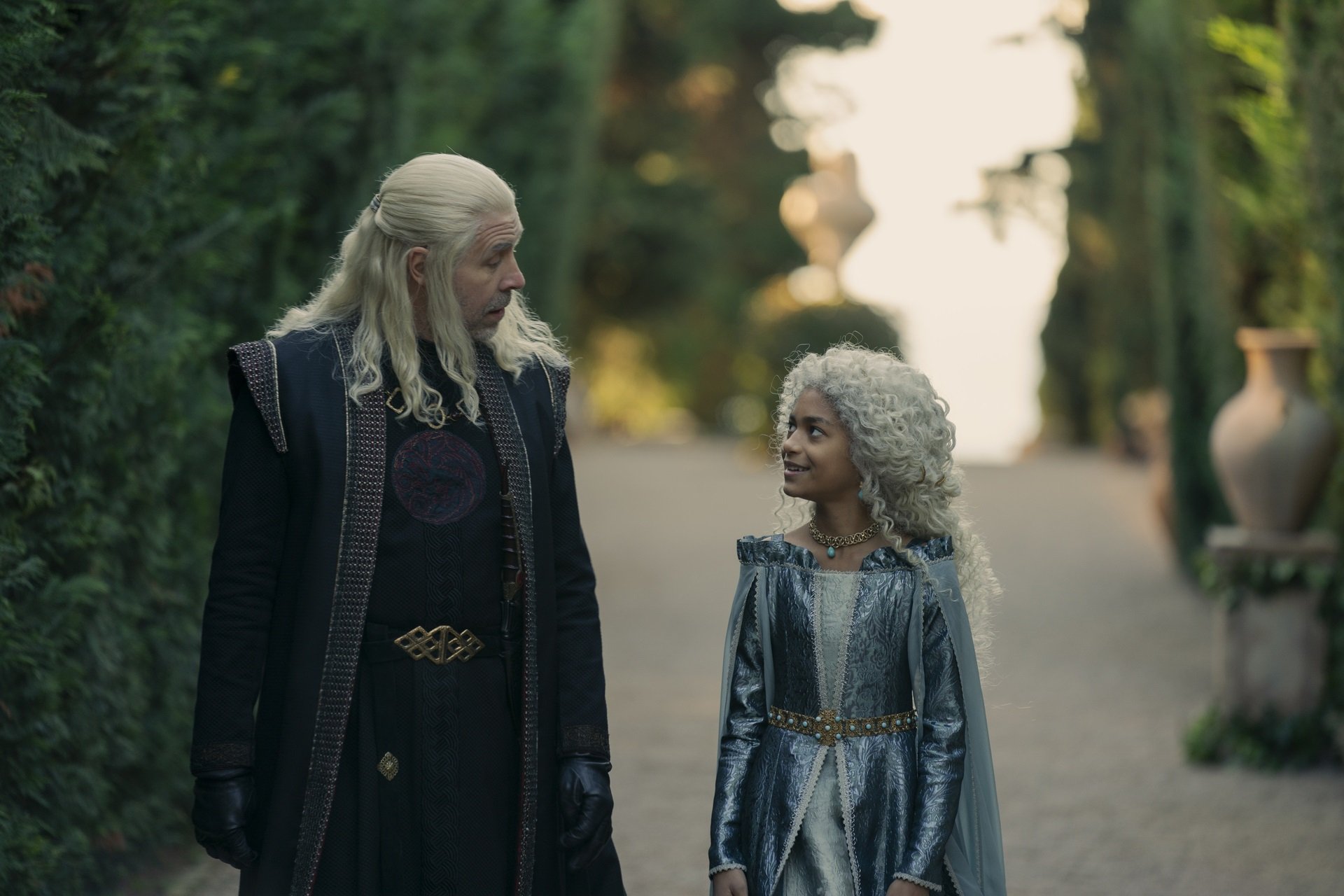 'House of the Dragon' Paddy Considine and Nova Mosé-Foueillis speaking to each other as King Viserys and Lady Laena Velaryon