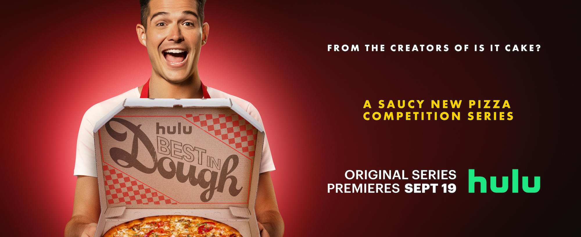 Hulu Original 'Best in Dough' arrives in September. Wells Adams, seen here holding a pizza, hosts the food competition.