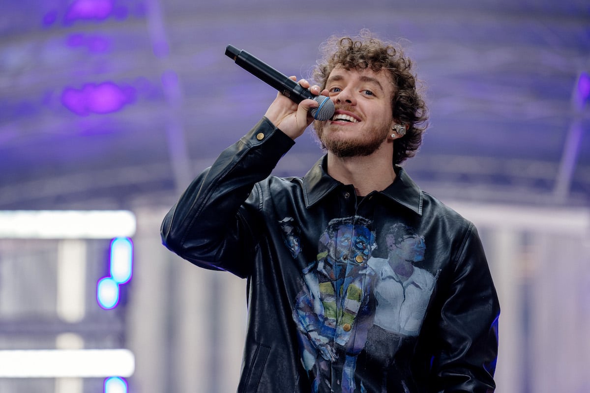 Jack Harlow, who fans suspect had plastic surgery, performs on stage.