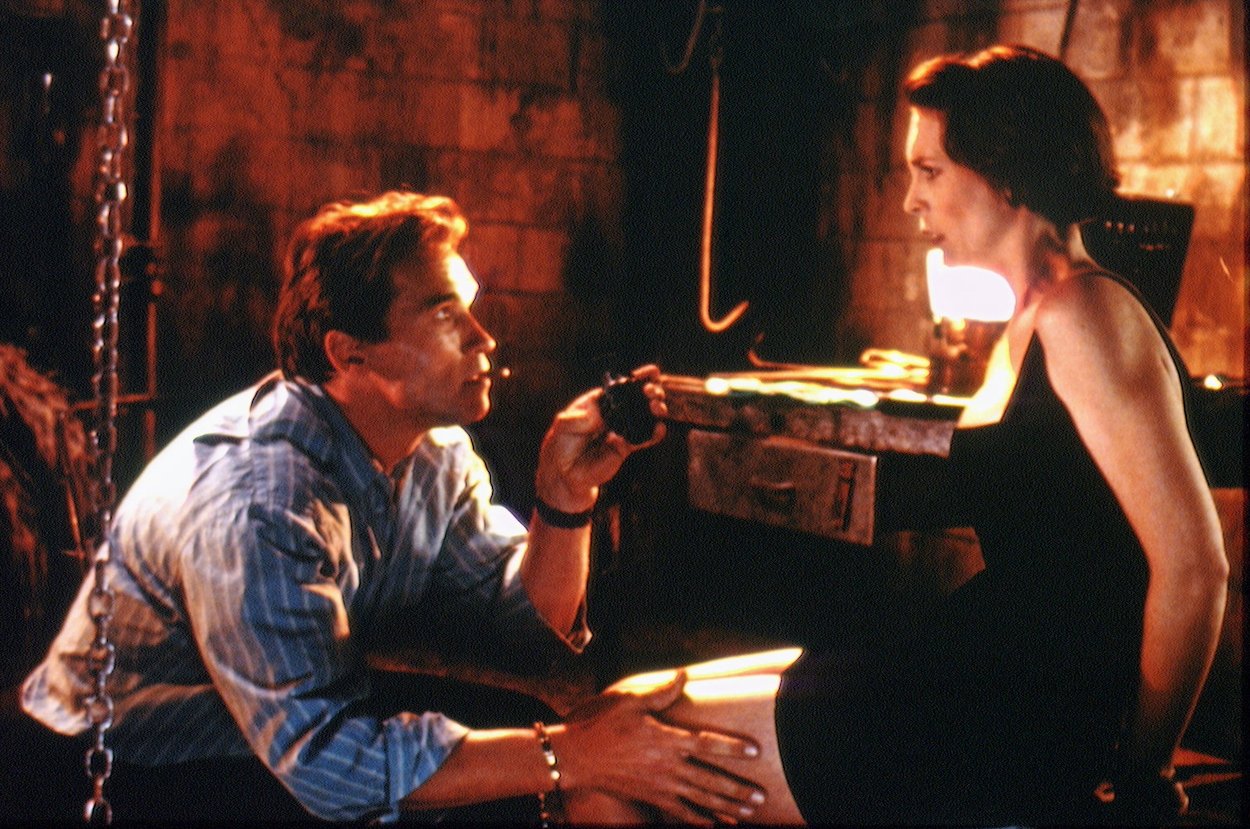 Arnold Schwarzenegger (left) and Jamie Lee Curtis in 'True Lies.' Curtis once praised Schwarzenegger for agreeing to a 'True Lies' change that most actors wouldn't.