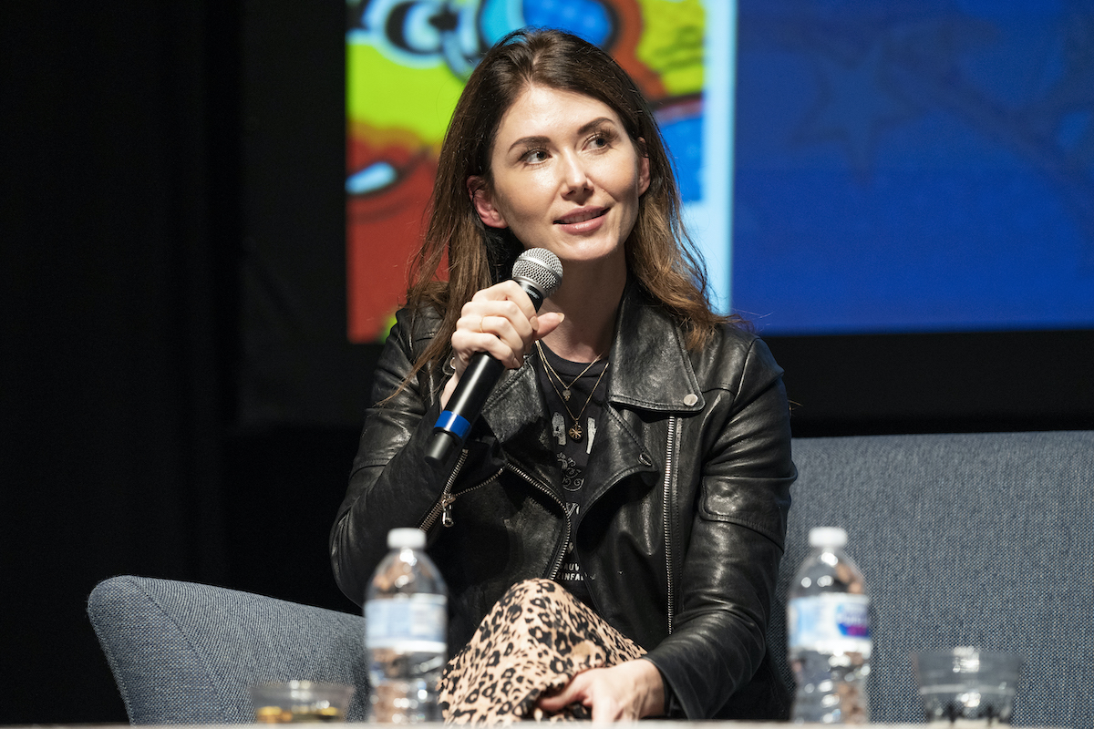 'Family Law actor Jewel Staite speaking into a microphone