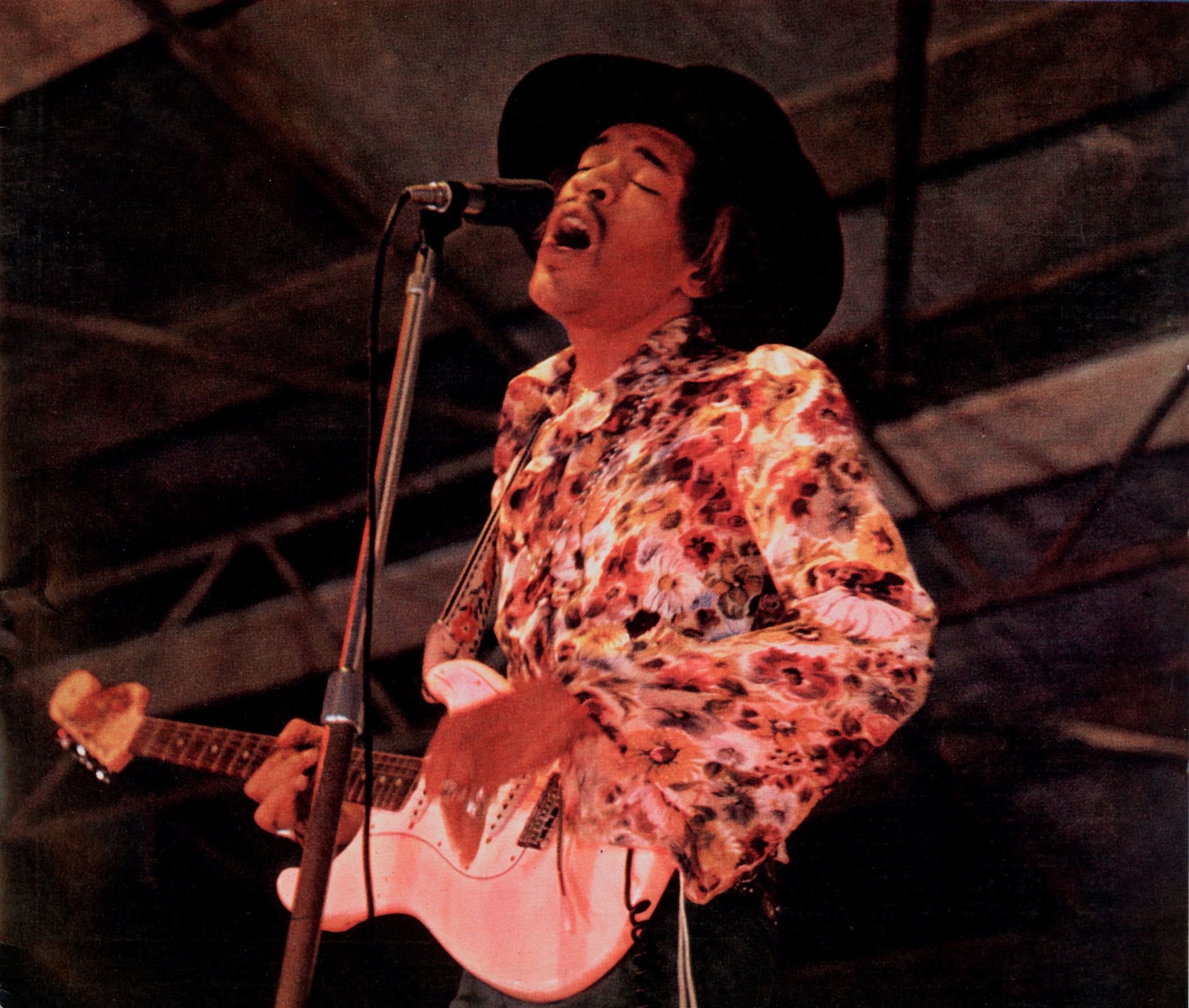 Jimi Hendrix (1942-1970) performs on stage at Woburn Pop Festival
