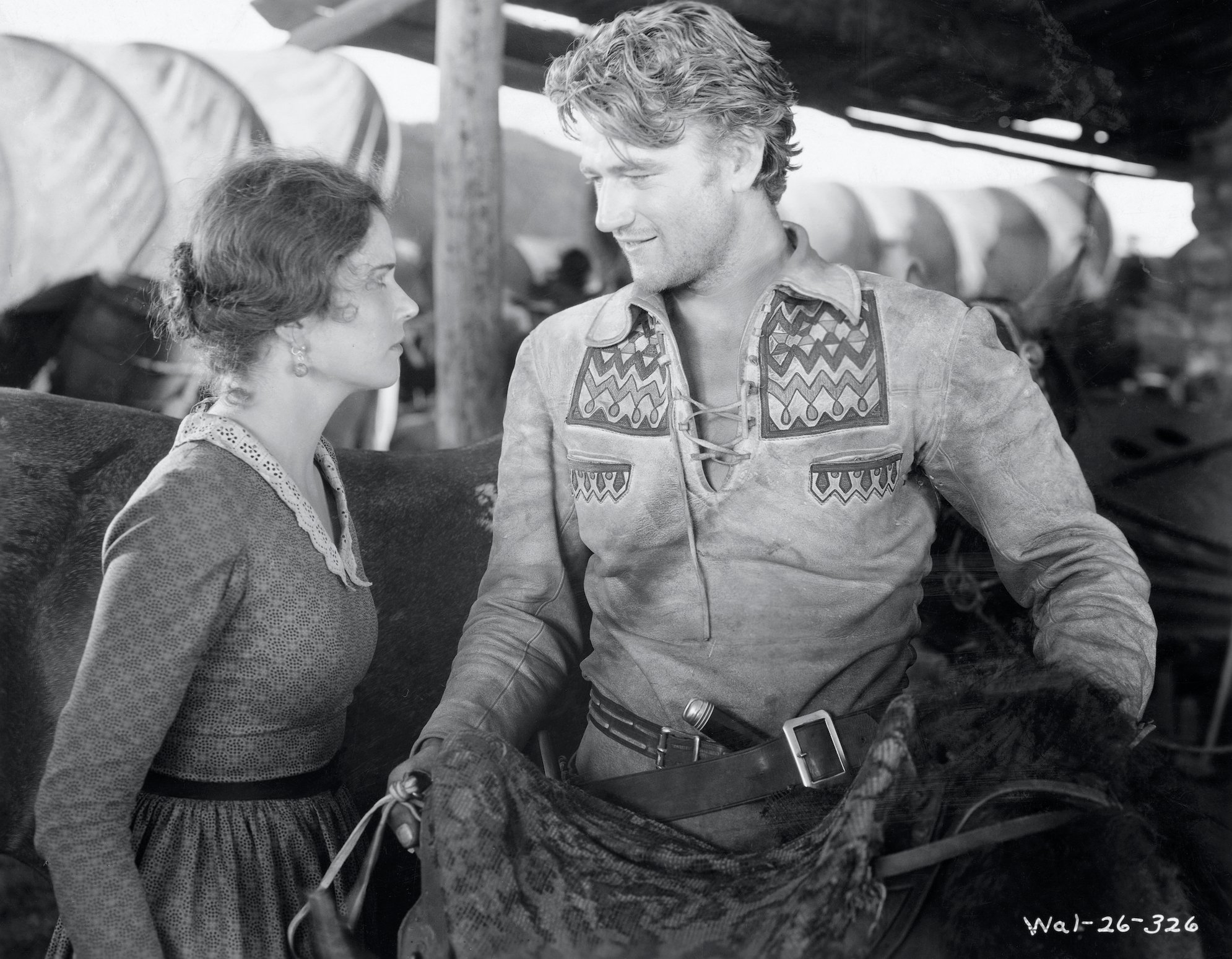 Marguerite Churchill and John Wayne in his first movie The Big Trail