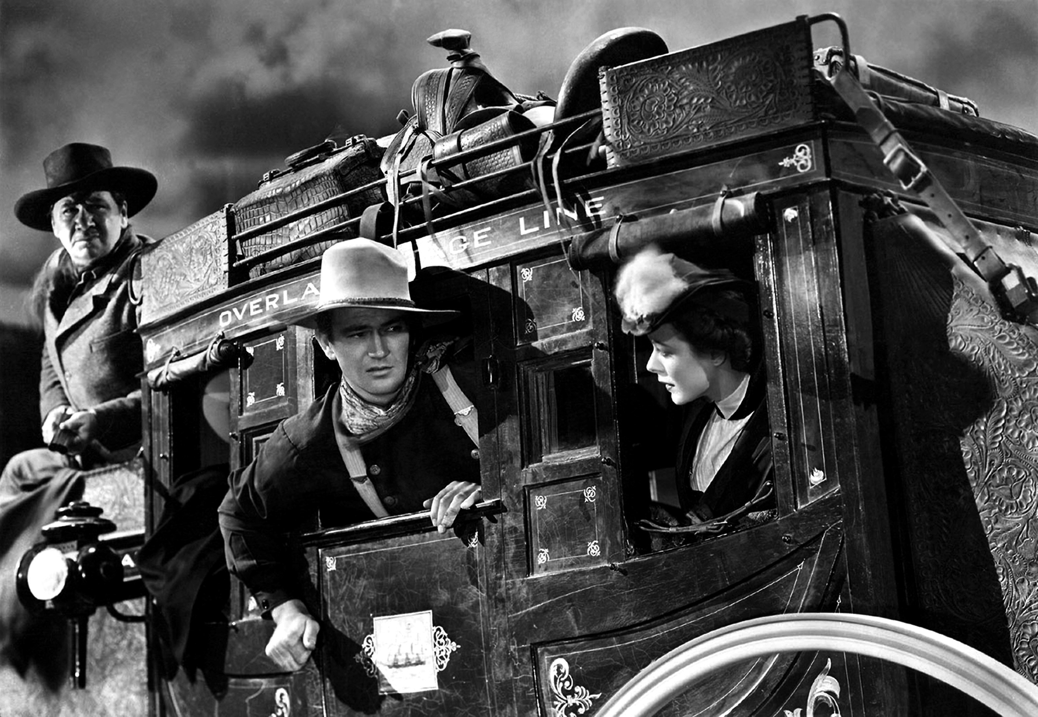 George Bancroft, John Wayne, and Louise Platt in Stagecoach in 1939