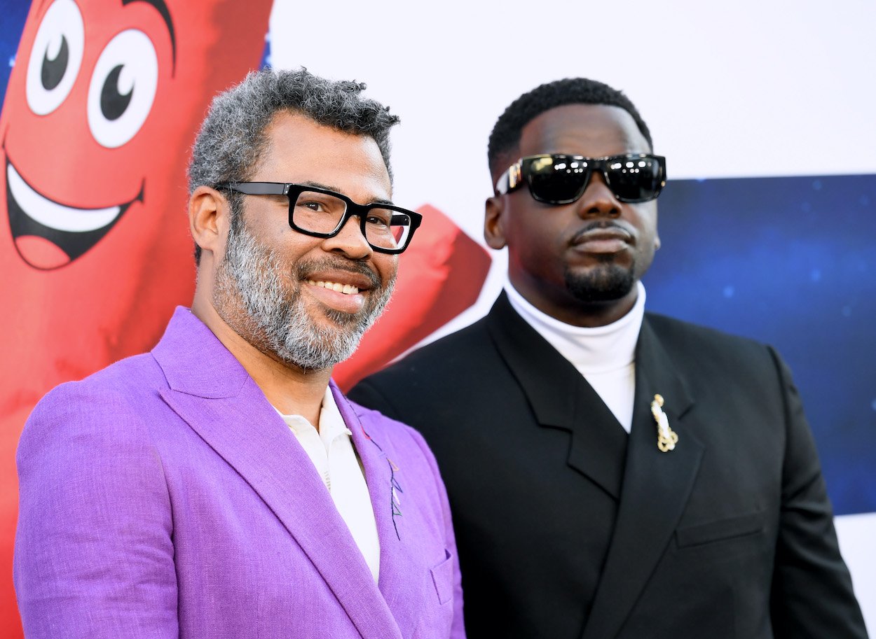 Jordan Peele (left) and Daniel Kaluuya attend the 'Nope' world premiere on July 18, 2022. Peele and Kaluuya have a strong director-actor relationship, but they're about to team up again in a much different way.