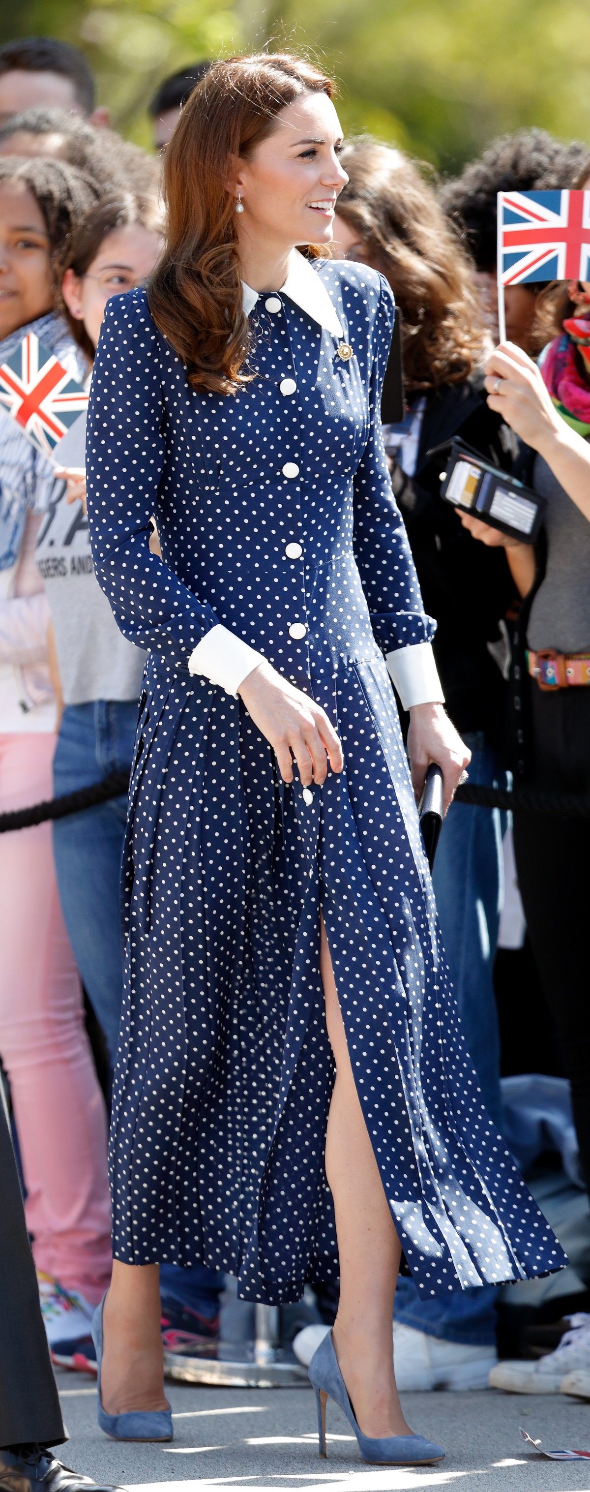 Kate Middleton wearing a long polka dot dress as she meets members of the public at 'D-Day Interception, Intelligence, Invasion' exhibition