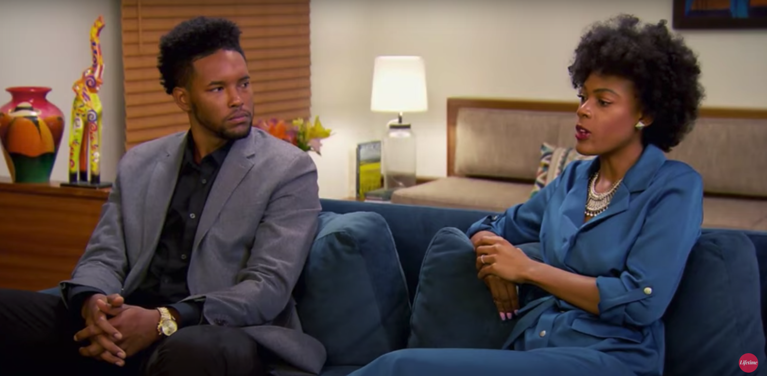 'Married at First Sight' Season 9 couple Keith and Iris sitting on a couch