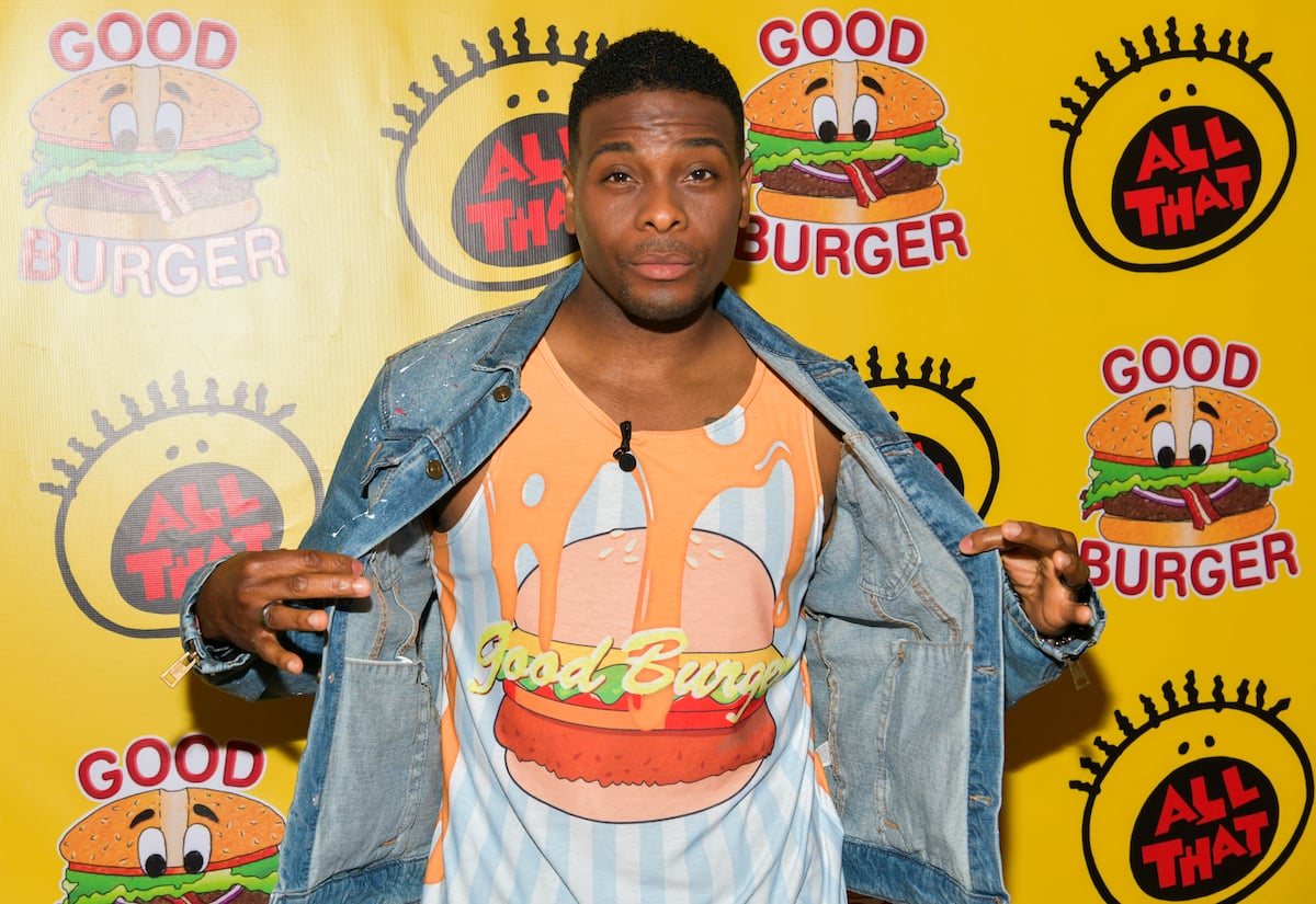 Kel Mitchell smiling wearing a 'Good Burger' t-shirt