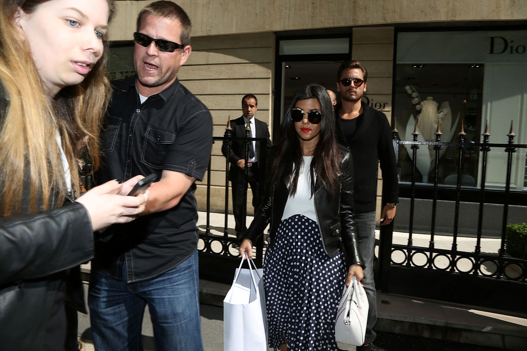 Kourtney Kardashian and Scott Disick leaving a Baby Dior store in Paris, France, in 2014