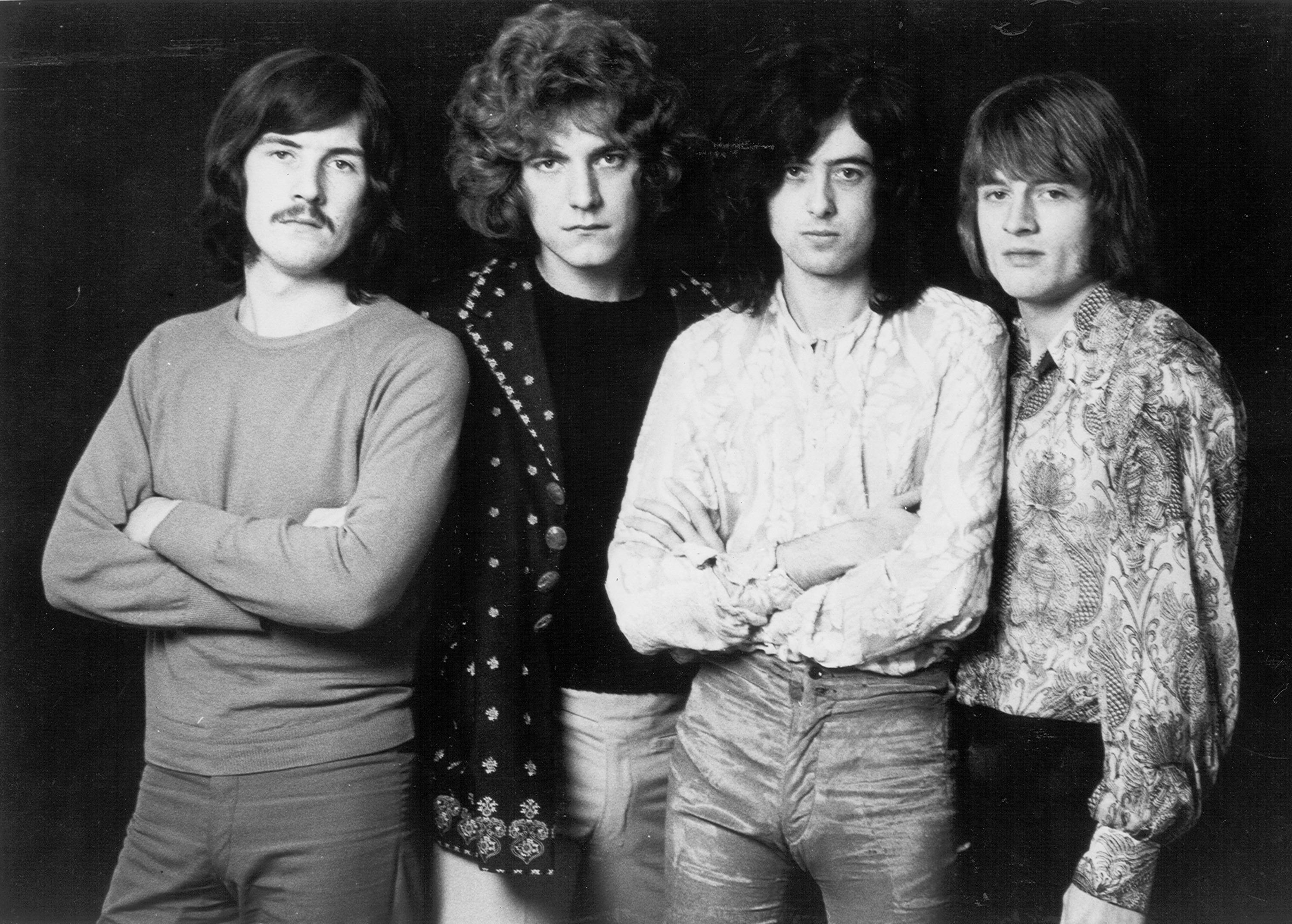 A black-and-white photo of John Bonham, Robert Plant, Jimmy Page, John Paul Jones of Led Zeppelin