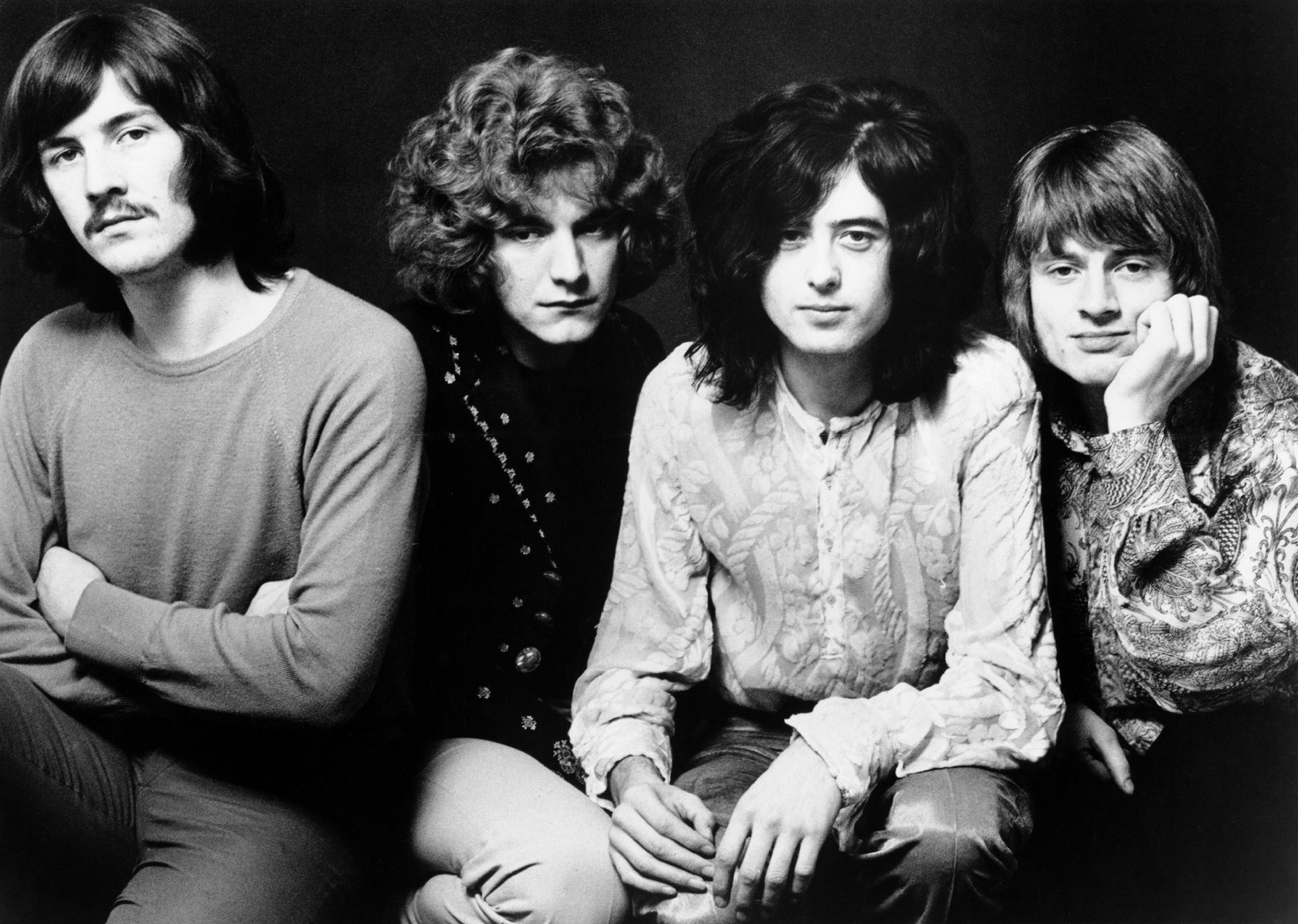 A black-and-white photo of John Bonham, Robert Plant, Jimmy Page, John Paul Jones of Led Zeppelin