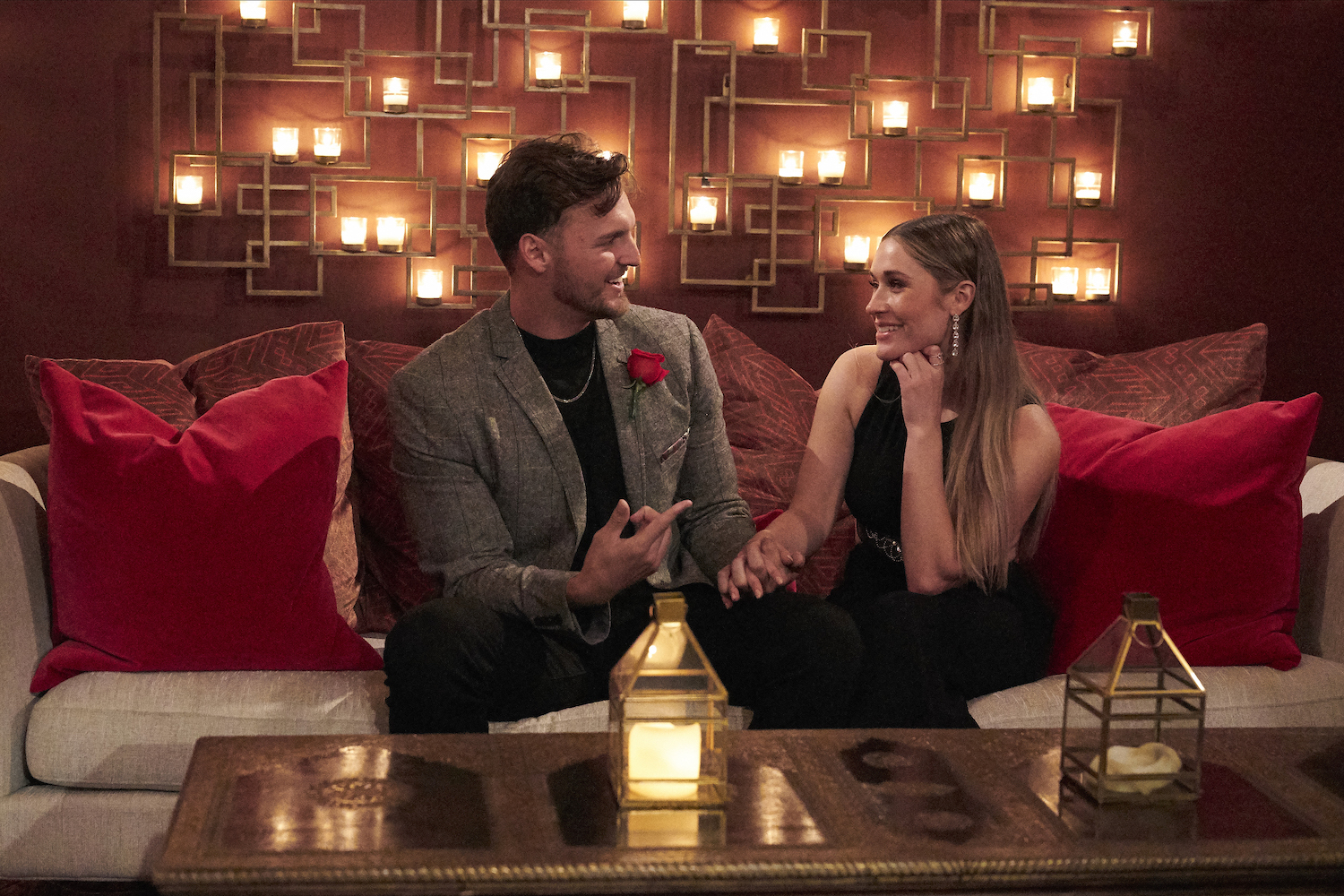 Logan Palmer and Rachel Recchia sitting on a couch together on 'The Bachelorette' Season 19