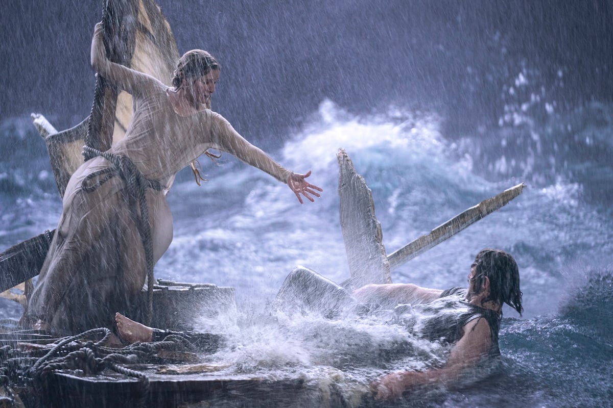 'Lord of the Rings: The Rings of Power' -- Galadriel (Morfydd Clark) reaches for Halbrand (Charlie Vickers) in an ocean action scene