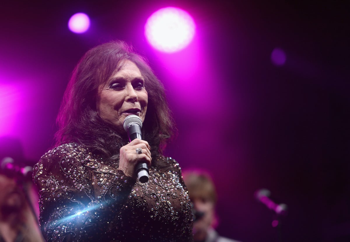 Loretta Lynn performing on stage