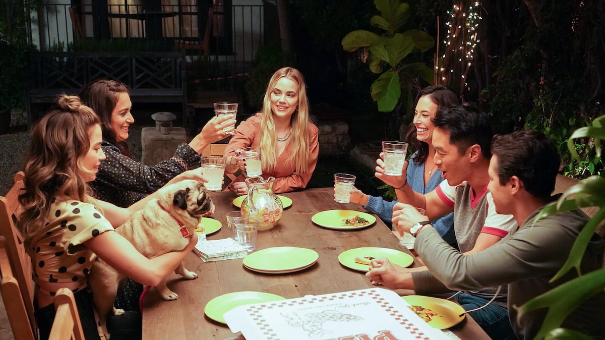 'Maggie' cast sitting around a table