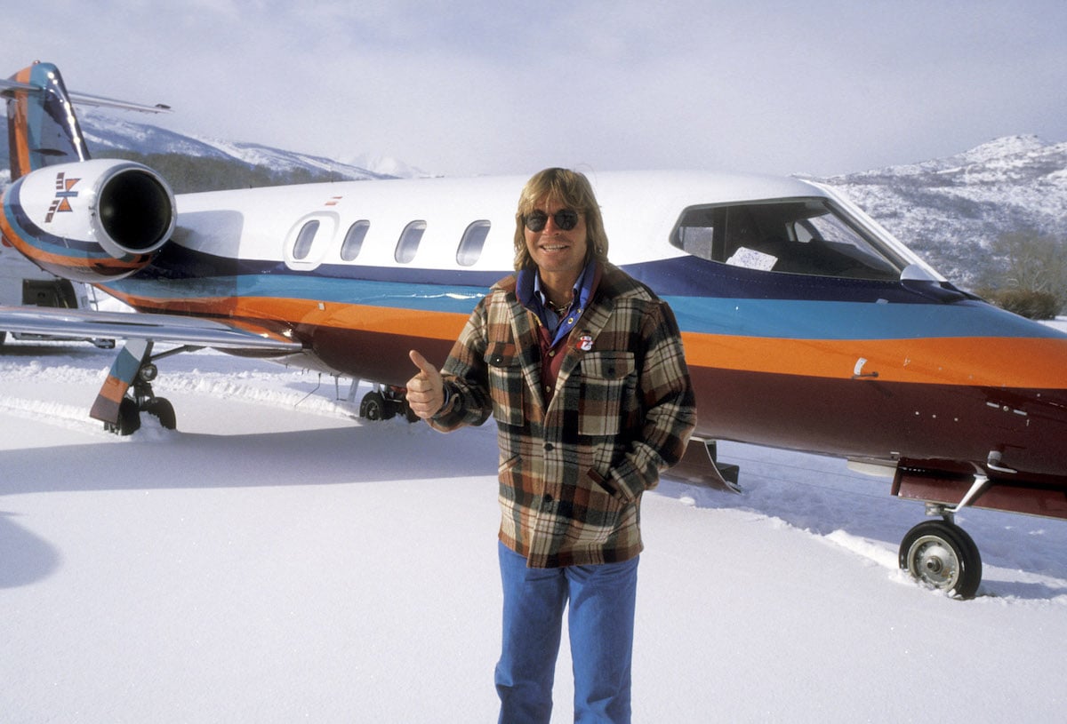 Musician John Denver arrives at the Aspen/Pitkin County Airport in Aspen, Colorado in 1977