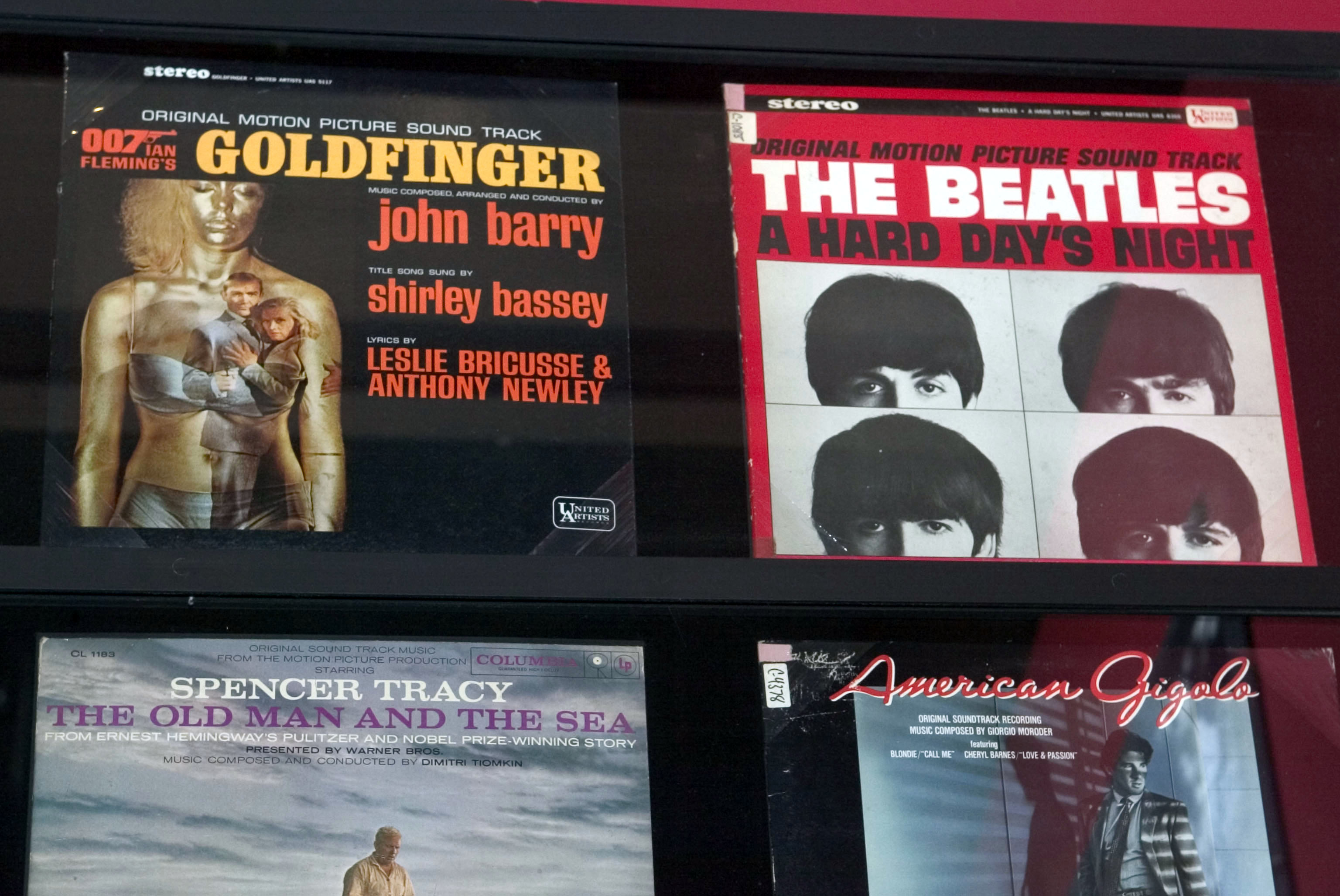 The soundtrack of the James Bond film 'Goldfinger' next to The Beatles' 'A Hard Day's Night' on a shelf