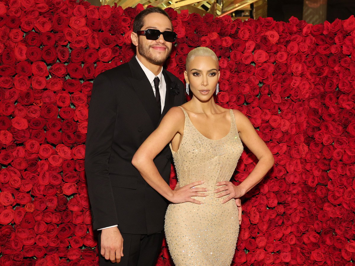 Pete Davidson and Kim Kardashian, who have vastly different net worths, at an event.