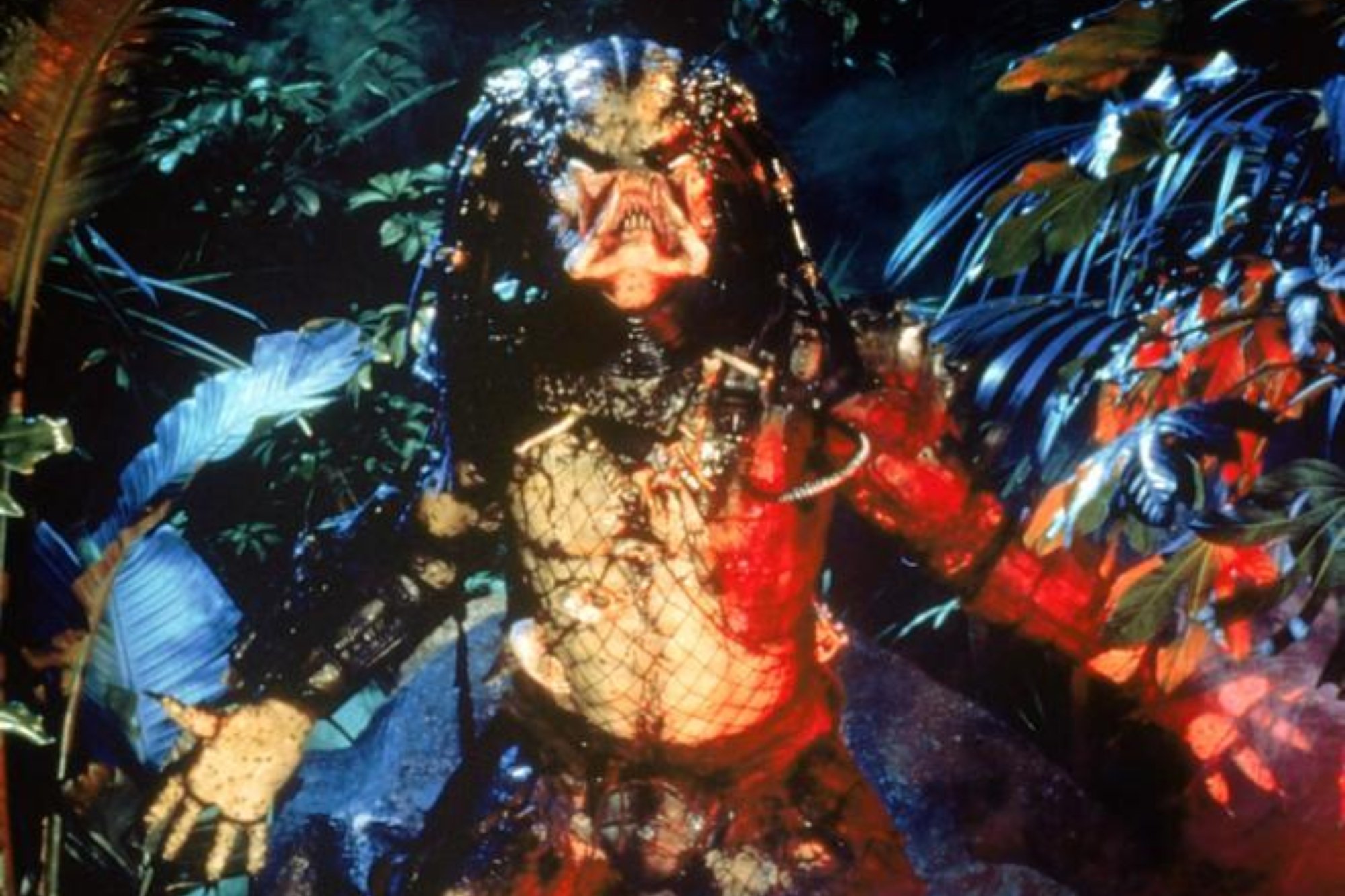 'Predator' movies Kevin Peter Hall as The Predator screeching toward the sky with his arms held out