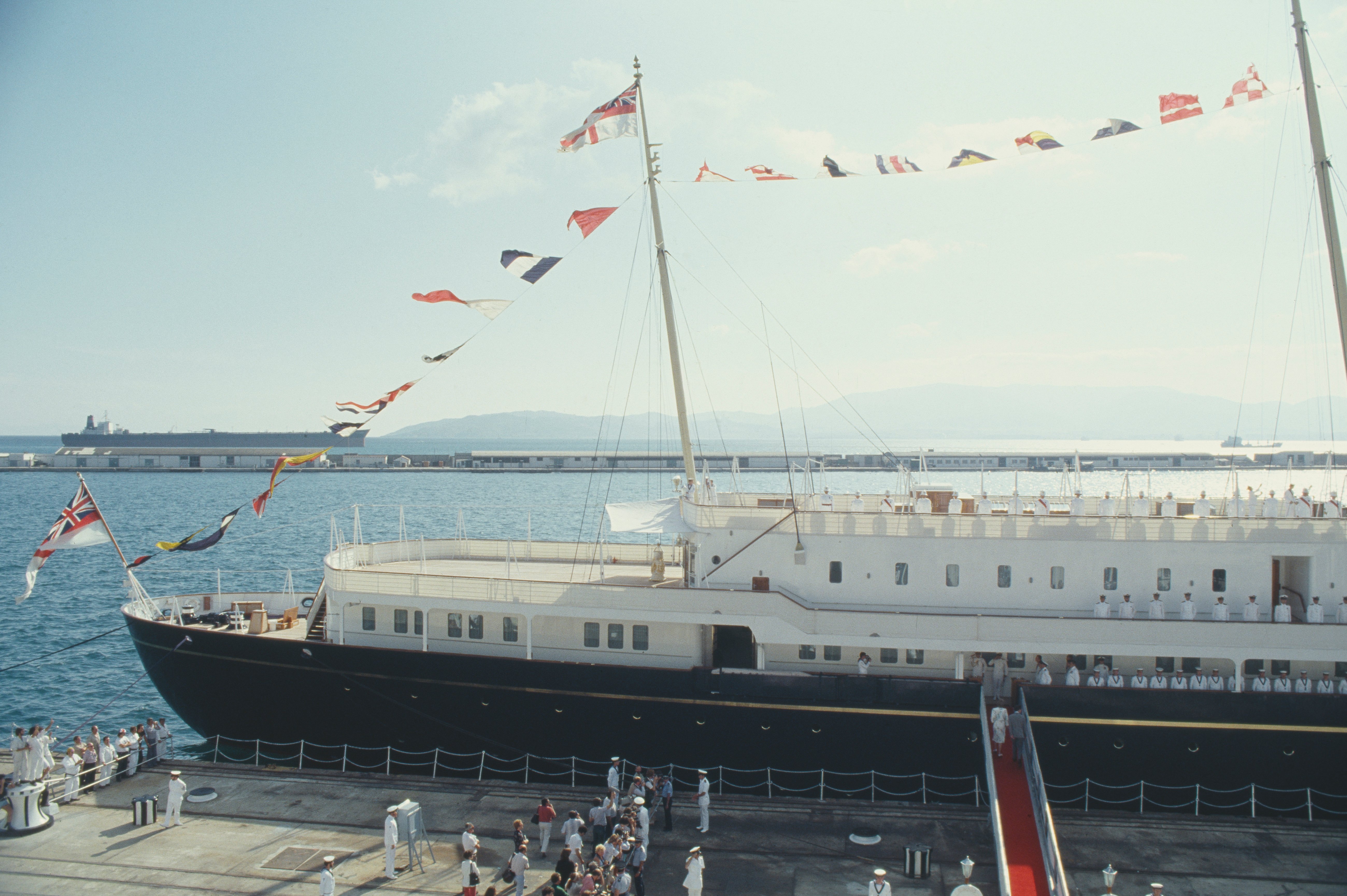 Prince Charles and Princess Diana boarding the Royal Yacht Britannia for their honeymoon cruise