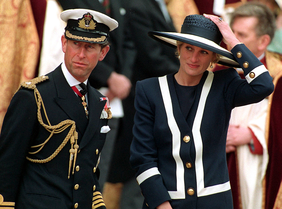 Prince Charles, who police interviewed about Princess Diana's death, stands next to Princess Diana