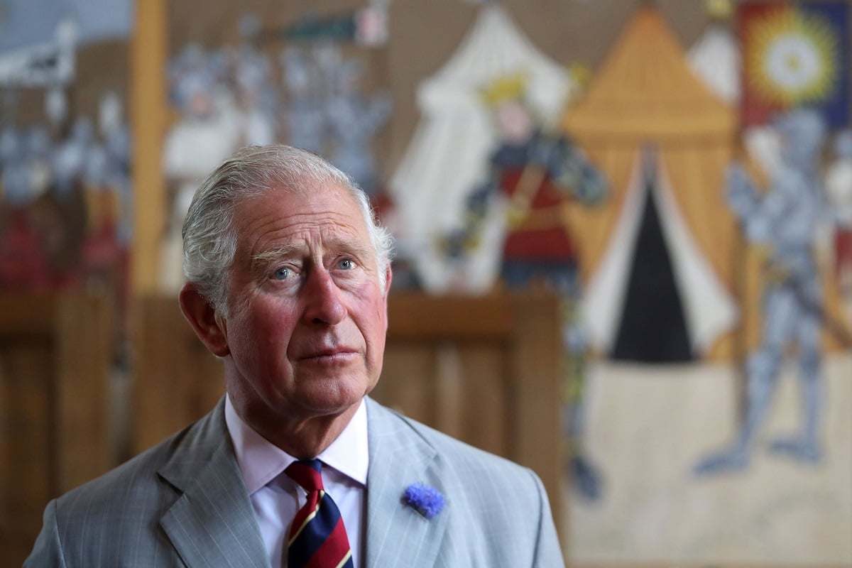 Prince Charles, who is reportedly "terrified" of taking over the throne, looking up during visit to Tretower Court