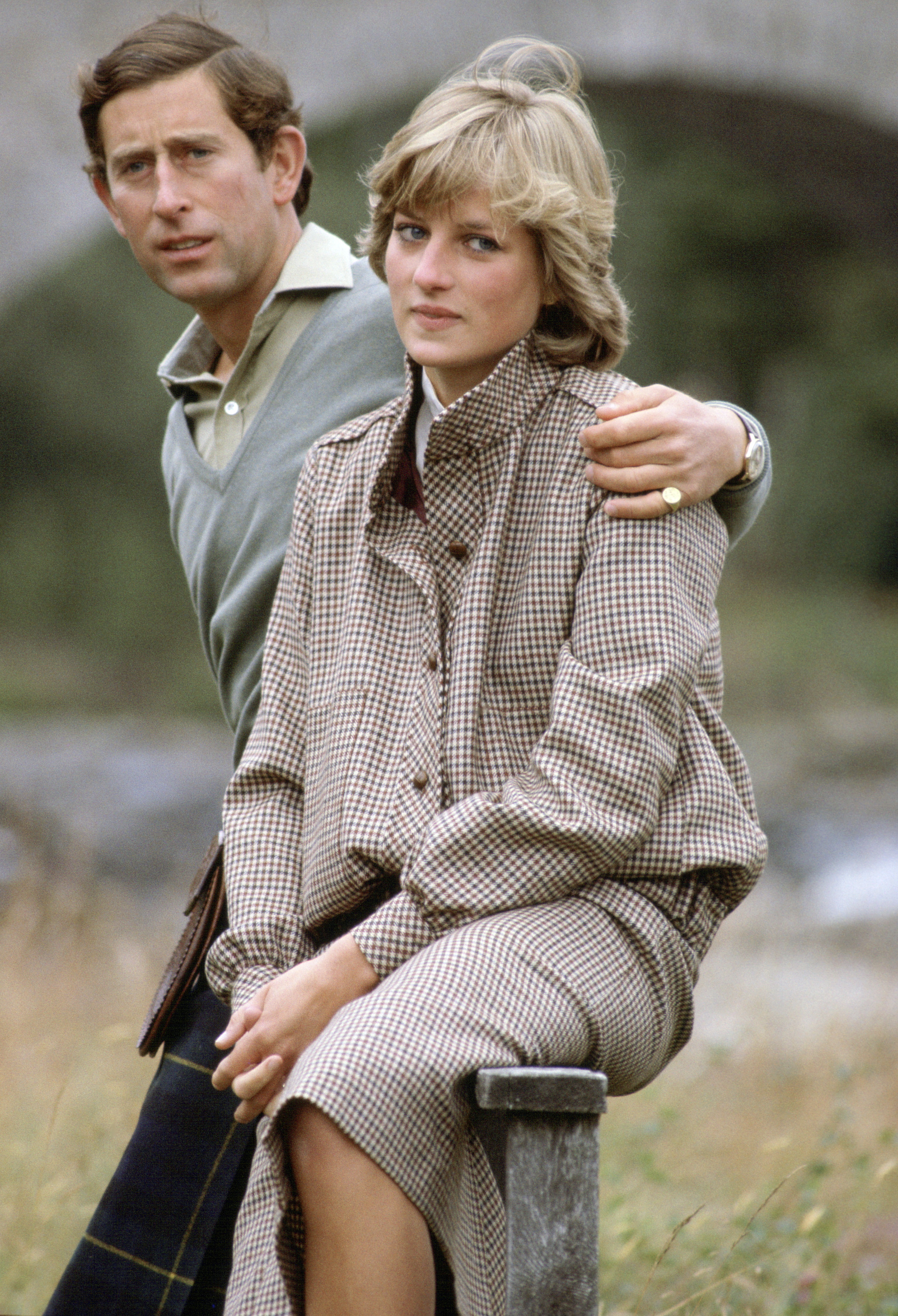 Prince Charles with his arm around Princess Diana during their honeymoon at Balmoral in Scotland