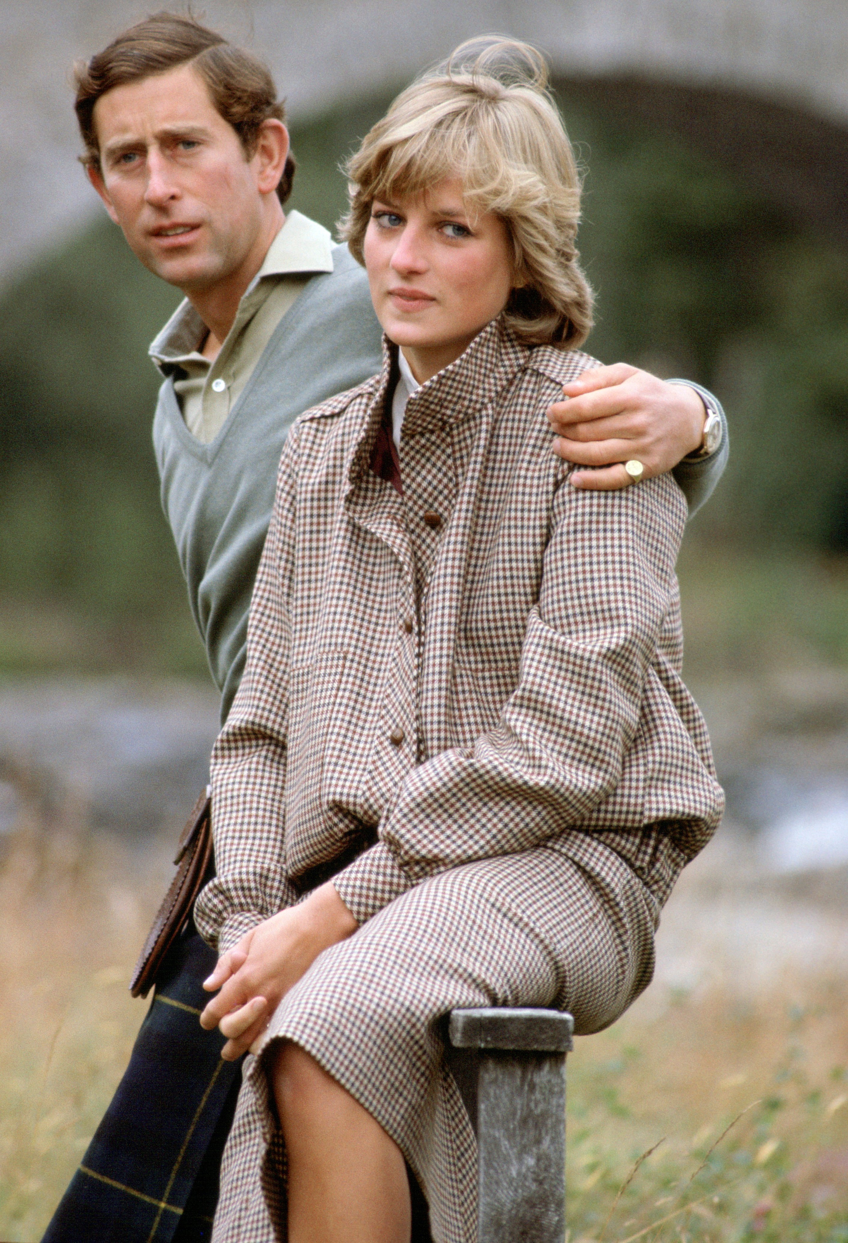 Prince Charles with his arm around Princess Diana during their honeymoon at Balmoral in Scotland