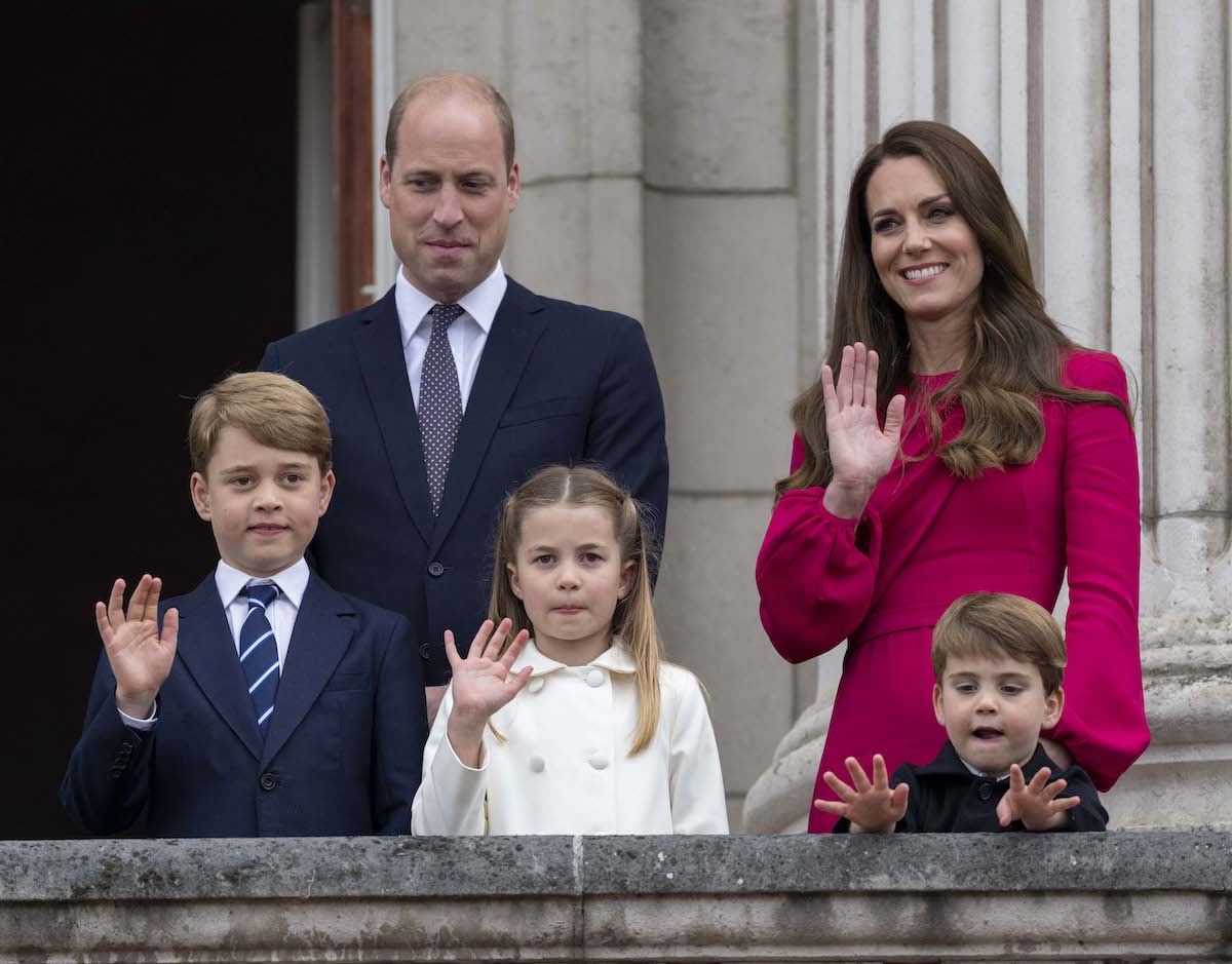 Prince George stands with Prince William and Princess Charlotte, who appeared in a Lionesses video on Twitter, while Kate Middleton and Prince Louis stand nearby