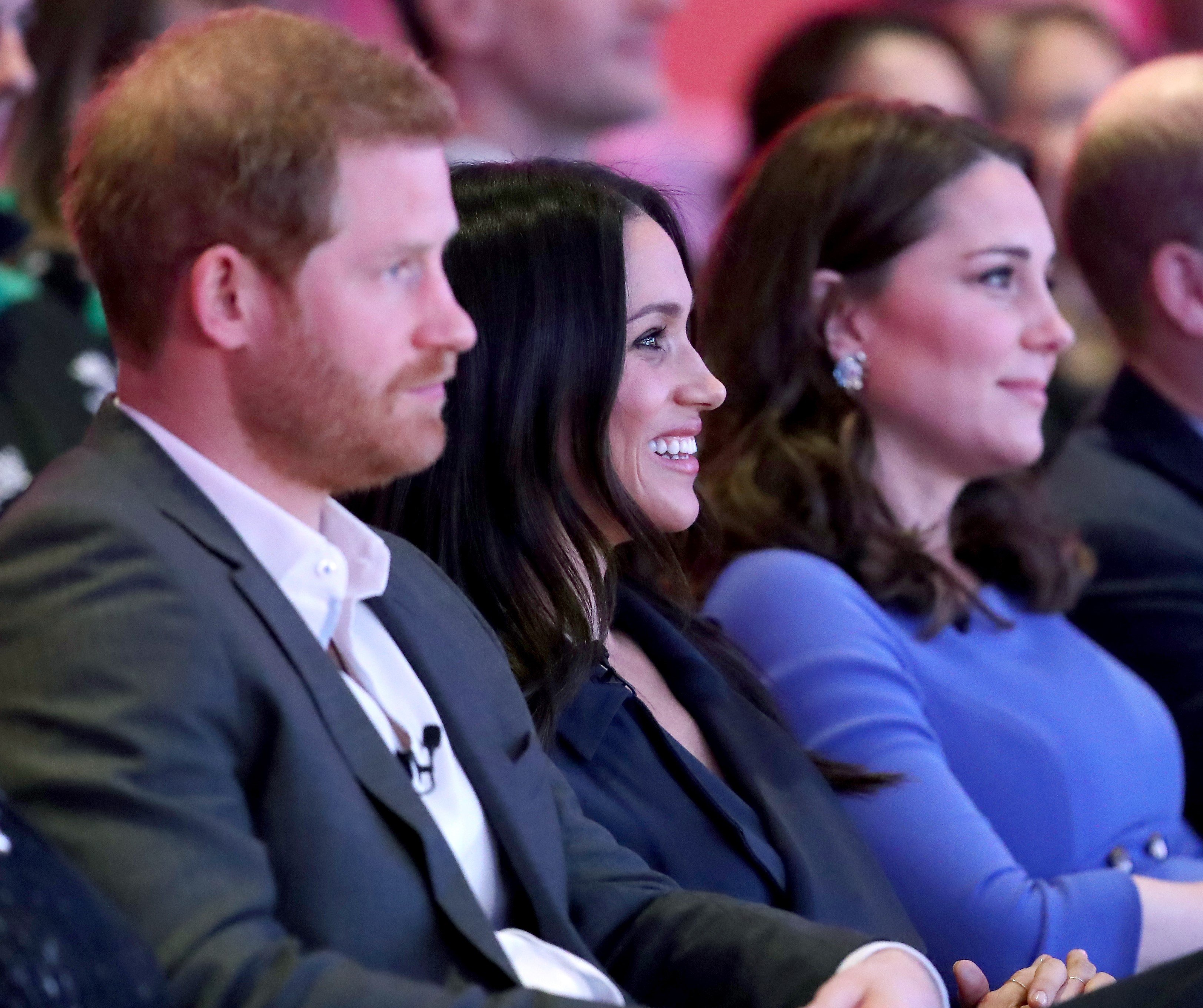 Prince Harry, Meghan Markle, and Kate Middleton attend the first annual Royal Foundation Forum