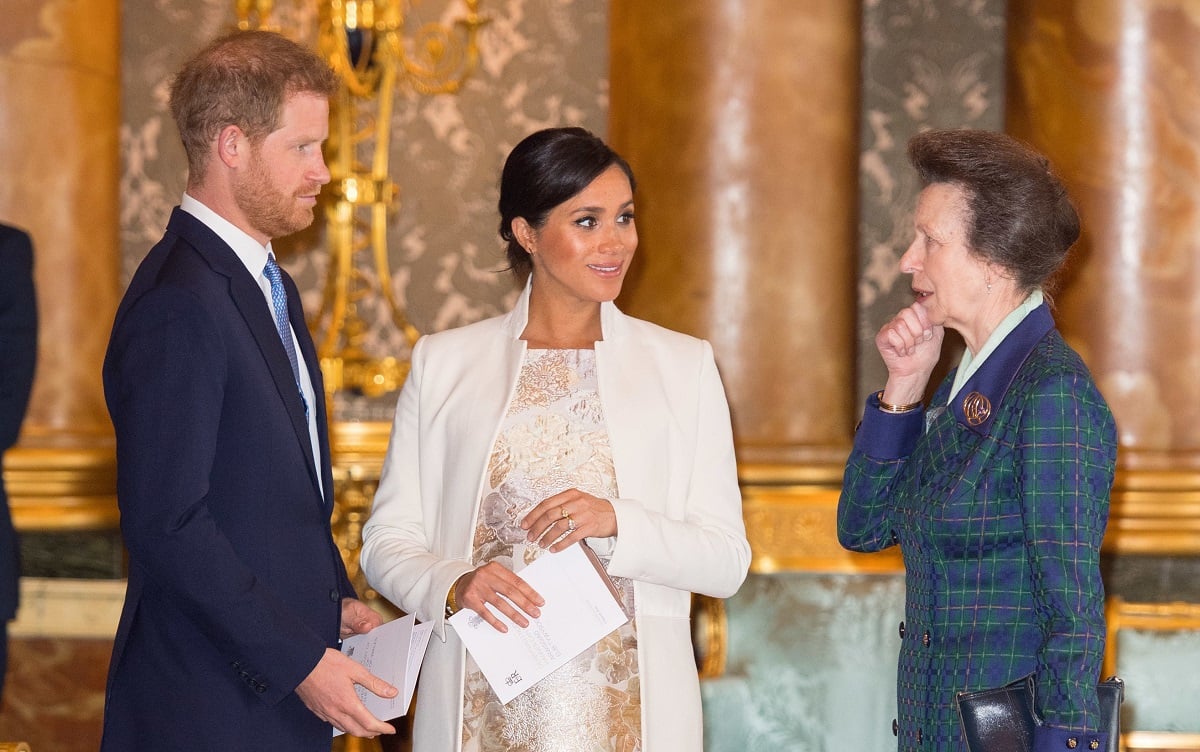 Prince Harry, Meghan Markle, and Princess Anne, who reportedly wants noting to do with the Sussexes' drama, attend a reception at Buckingham Palace