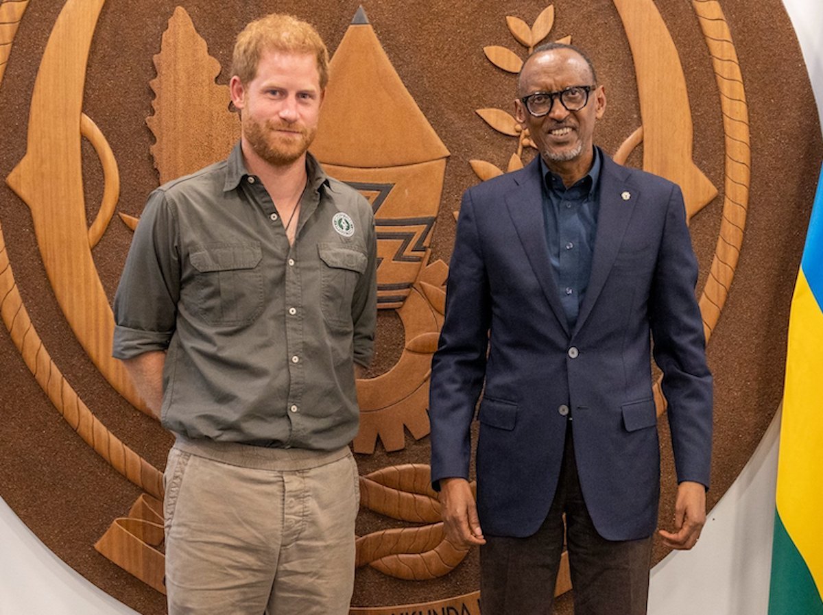 Prince Harry, whose Africa trip could've been a message to 'doubters' about him and Meghan Markle according to a commentator, stands next to Rwandan President Paul Kagame