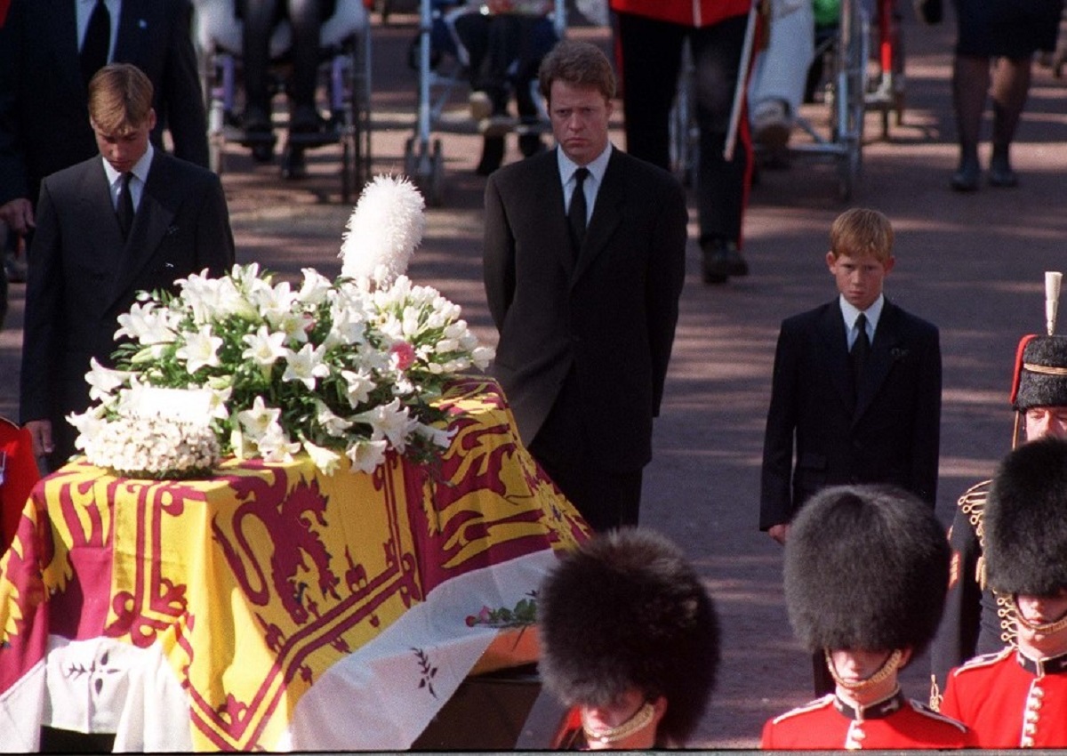 Prince William, Charles Spencer, and Prince Harry walking behind Princess Diana's coffin
