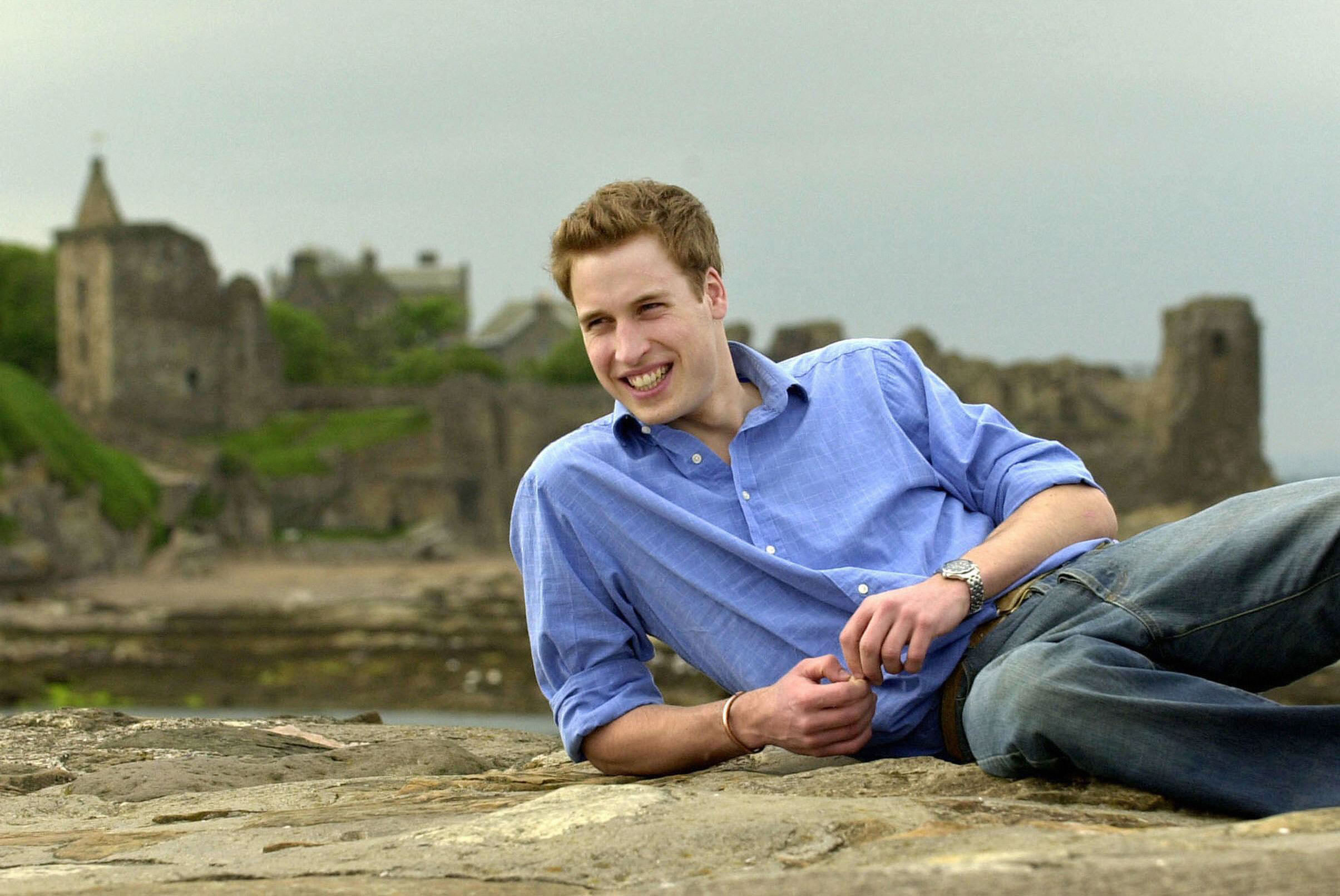 Prince William poses on the pier at University of St. Andrews in Scotland